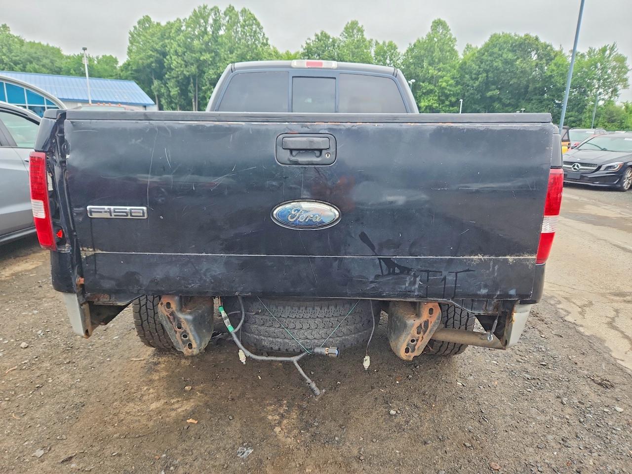 2007 Ford F150 Black vin: 1FTPX14587FB66912