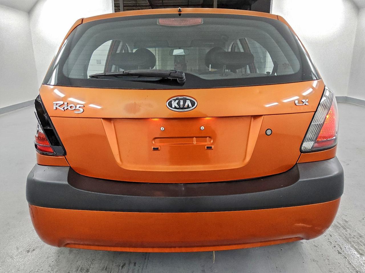 2009 Kia Rio5 Lx Orange vin: KNADE243896567101