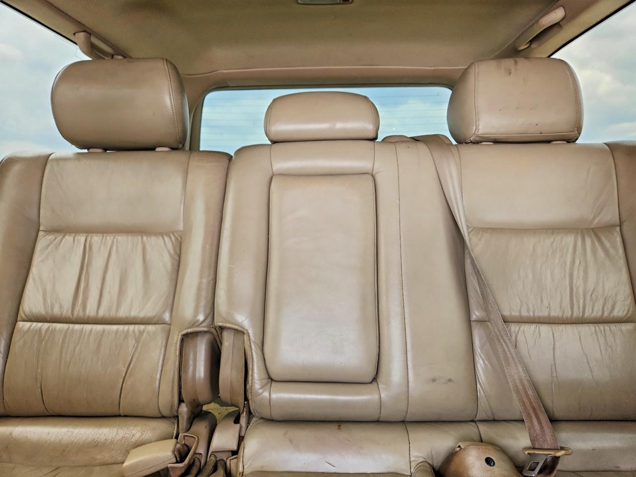 1999 Toyota Land Cruiser Base Gold vin: JT3HT05J5X0027141