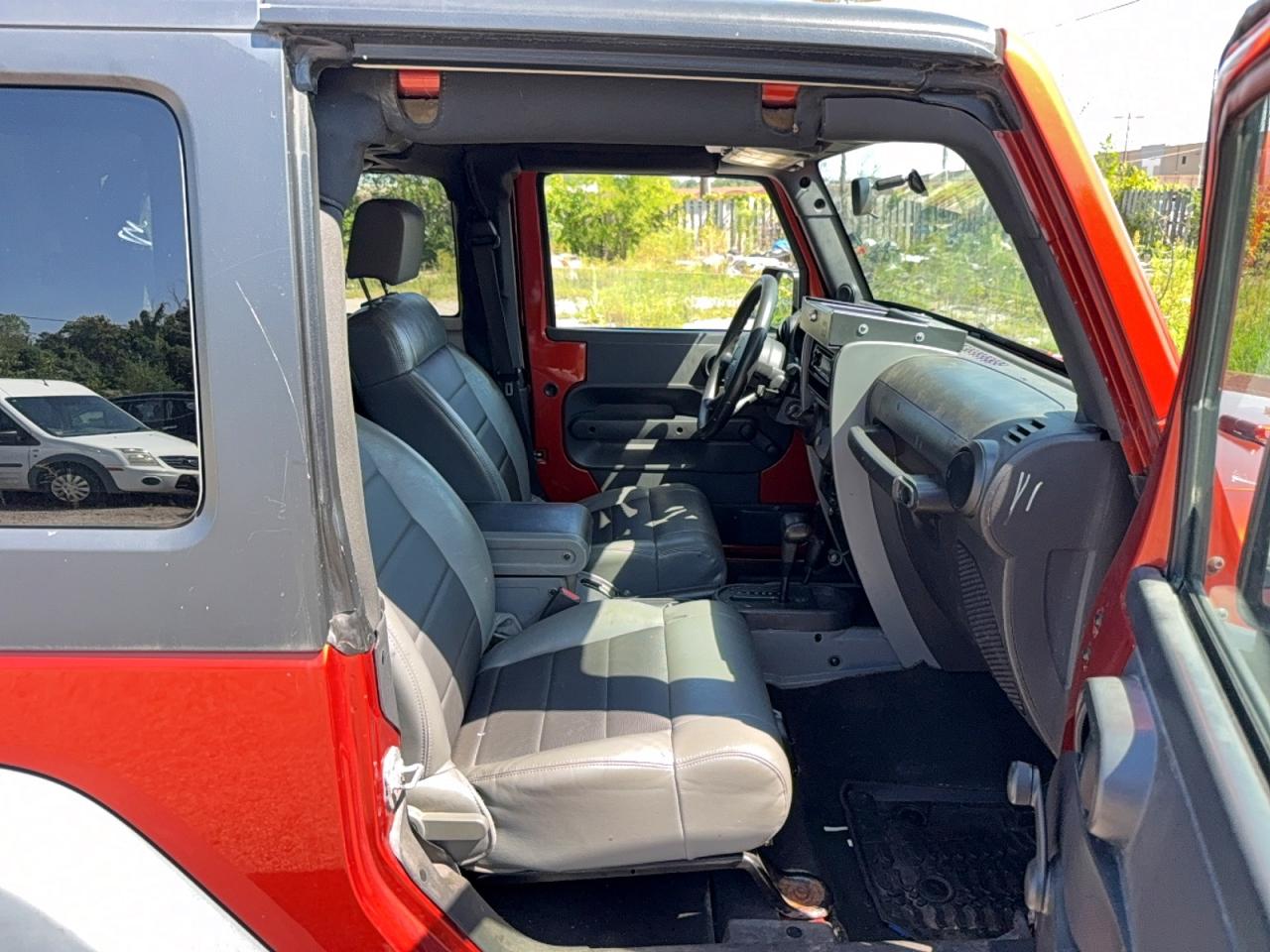2009 Jeep Wrangler X Orange vin: 1J4FA24149L770116