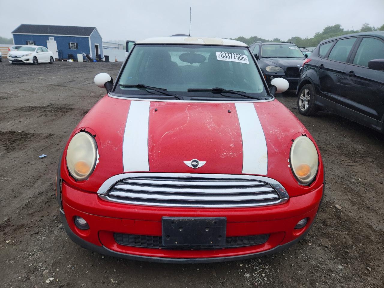 2009 Mini Cooper Red vin: WMWMF33529TW76970