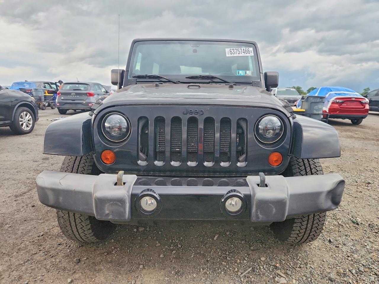 2012 Jeep Wrangler Unlimited Sahara Черный vin: 1C4BJWEG2CL254794