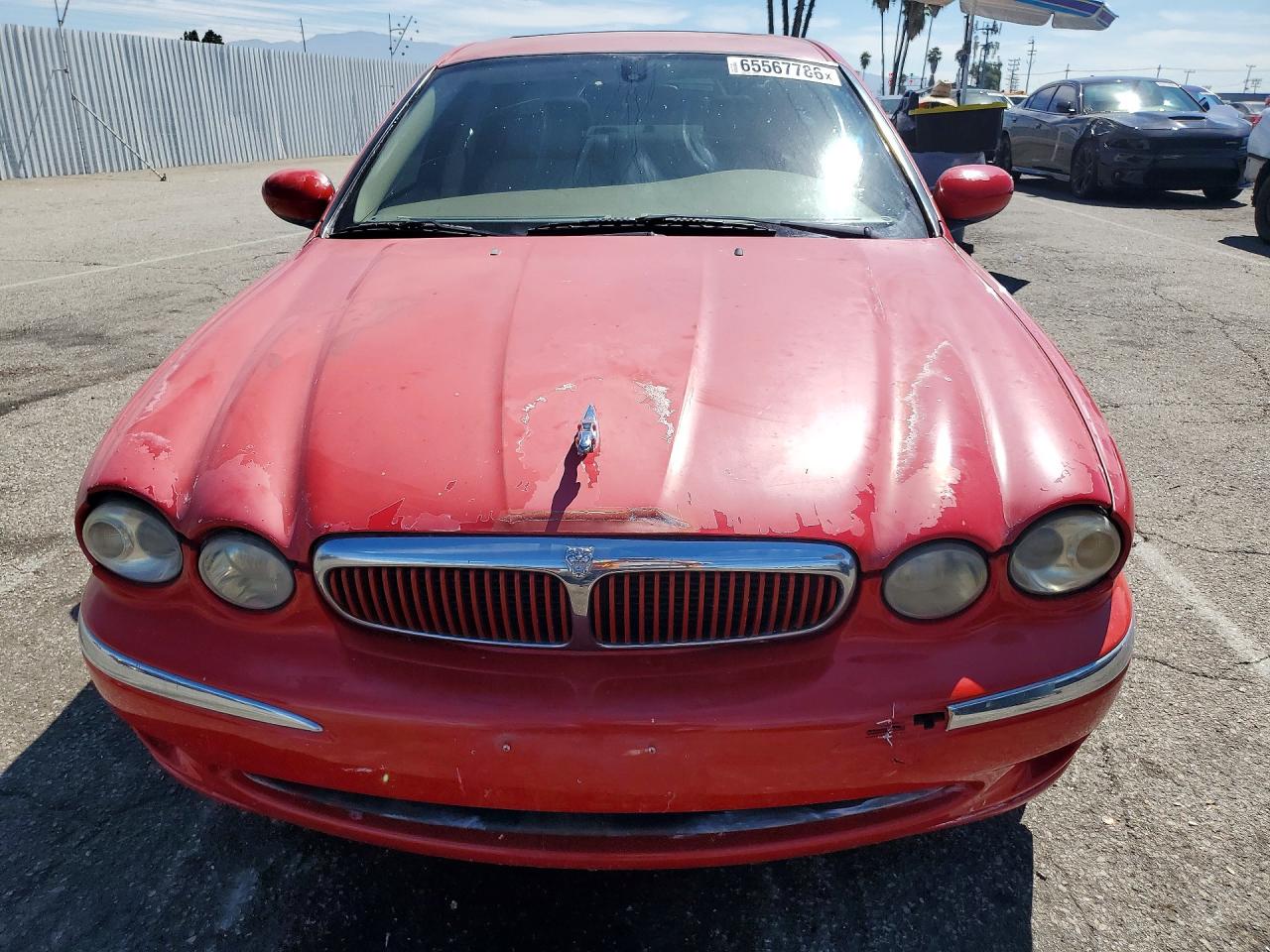2003 Jaguar X-type 2.5 Red vin: SAJEA51D33XC86945