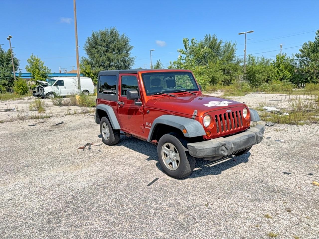 2009 Jeep Wrangler X Orange vin: 1J4FA24149L770116