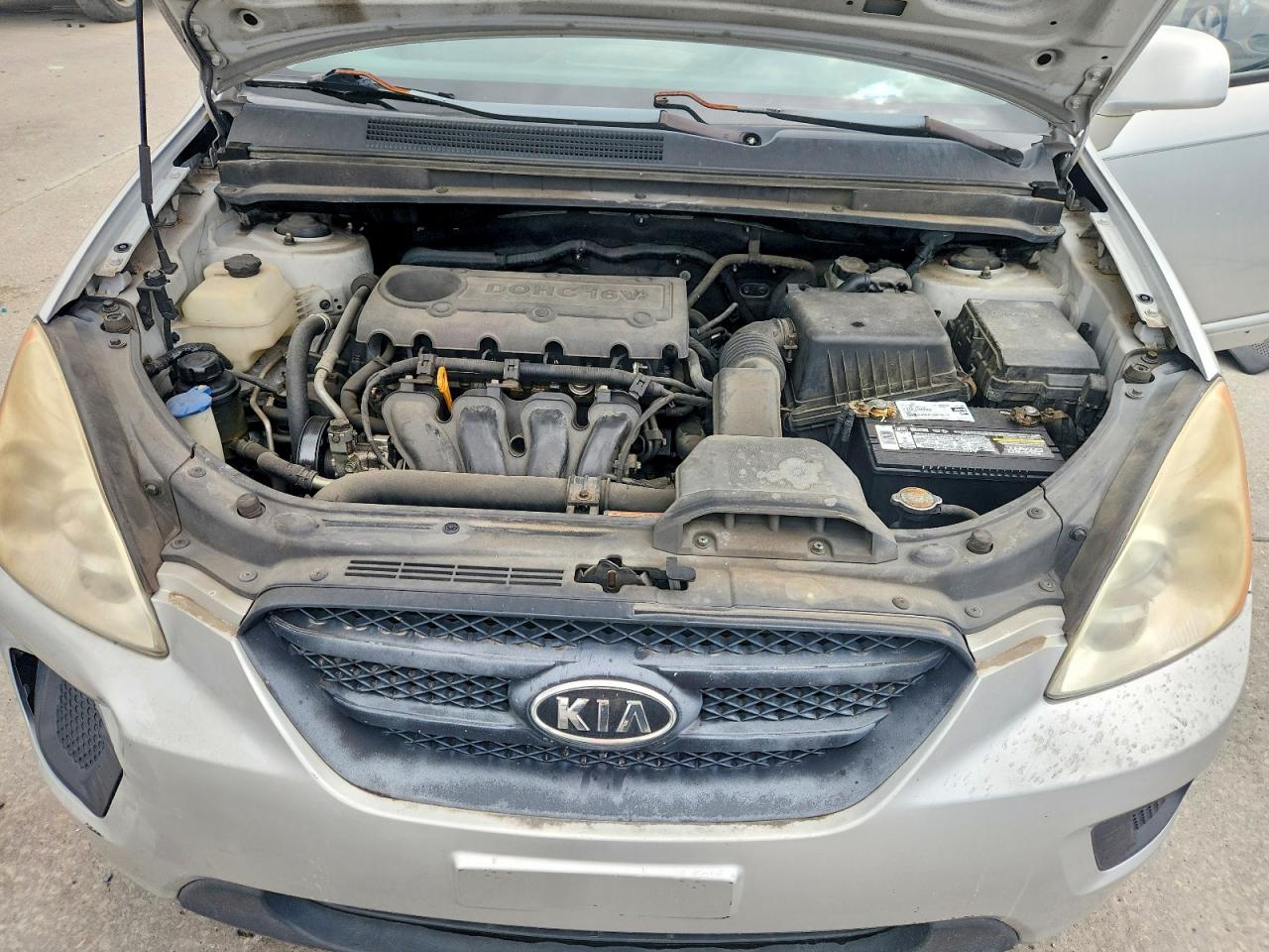 2009 Kia Rondo Base Серебряный vin: KNAFG528797271788