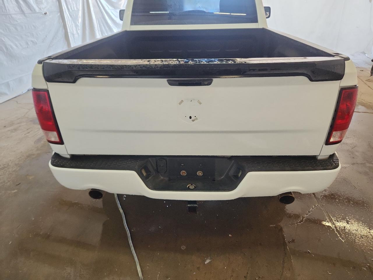 2013 Ram 1500 St White vin: 3C6JR6AT5DG583681 Damage: Rear Emblem, Missing, Replacement Required