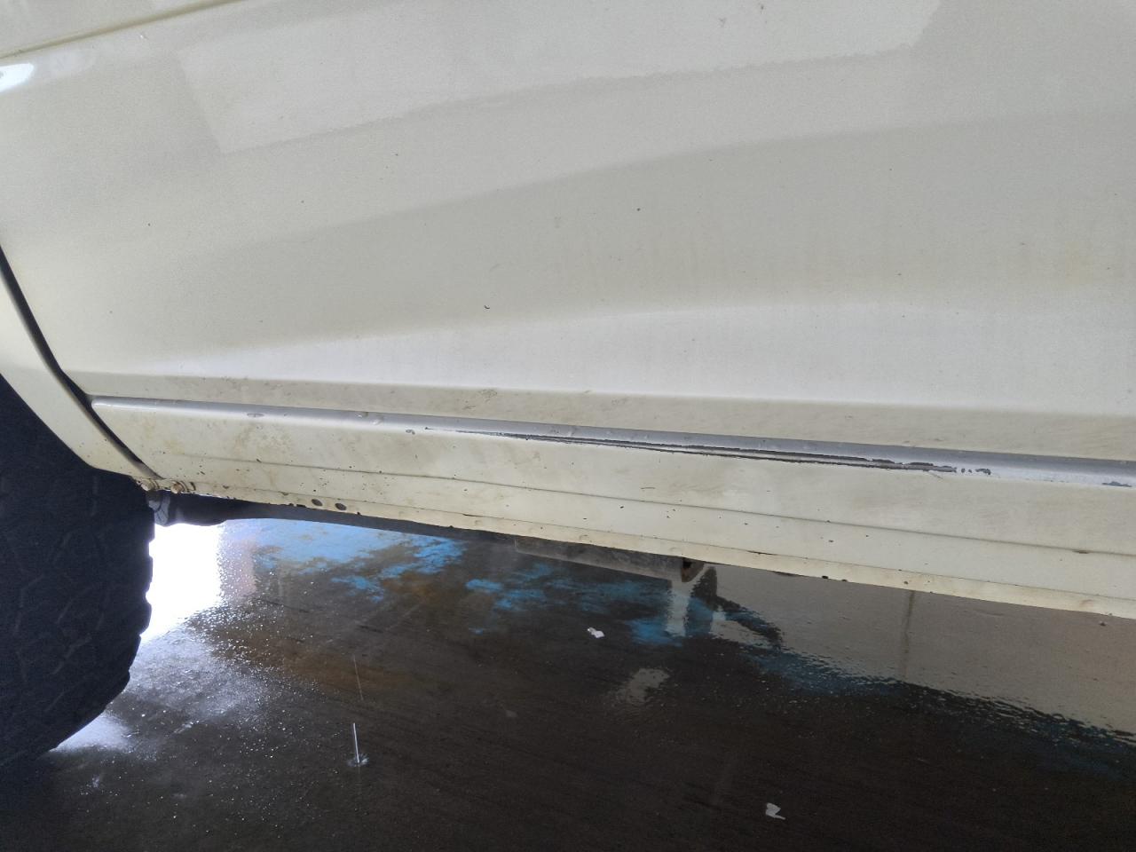 2014 Ram 2500 St White vin: 3C6LR5AT3EG319122 Damage: Left Rocker Panel, Dent(S) W/ Paint Dmg, 9 To 10 Inches