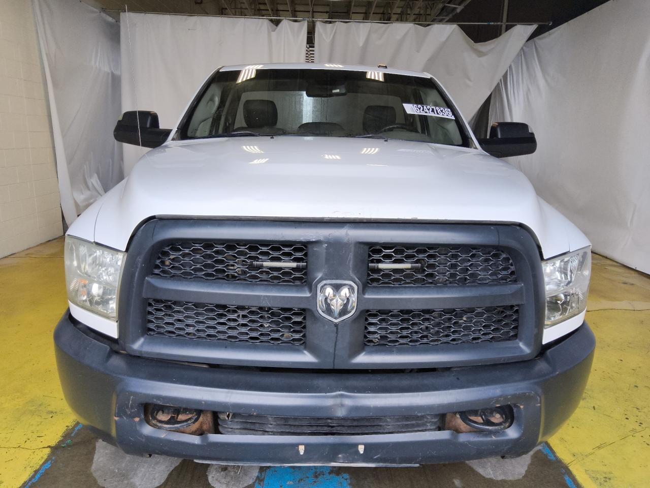 2014 Ram 2500 St White vin: 3C6LR5AT3EG319122 Damage: Front Bumper Molding, Broken, Replacement Required