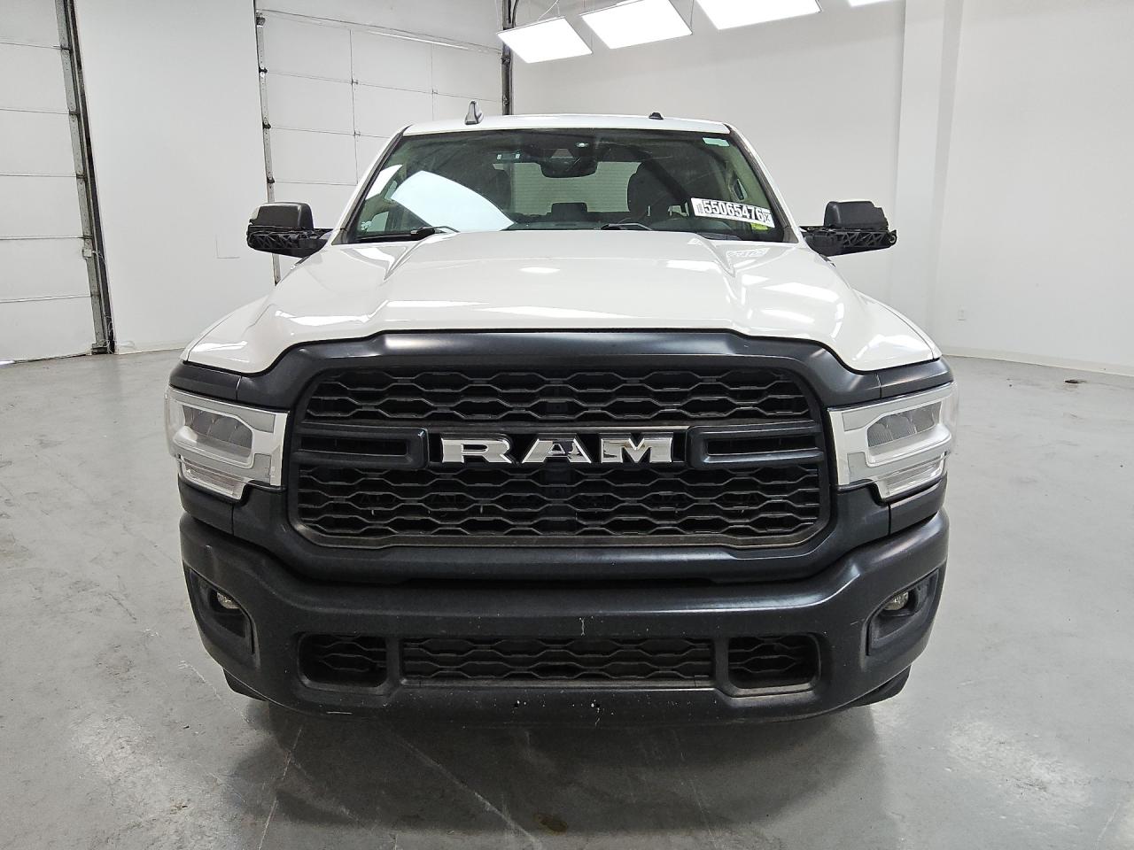 2019 Ram 2500 Tradesman White vin: 3C6UR4HJ9KG573755 Damage: Front Bumper, Dent(S) W/No Paint Dmg, 1 To 2 Inches