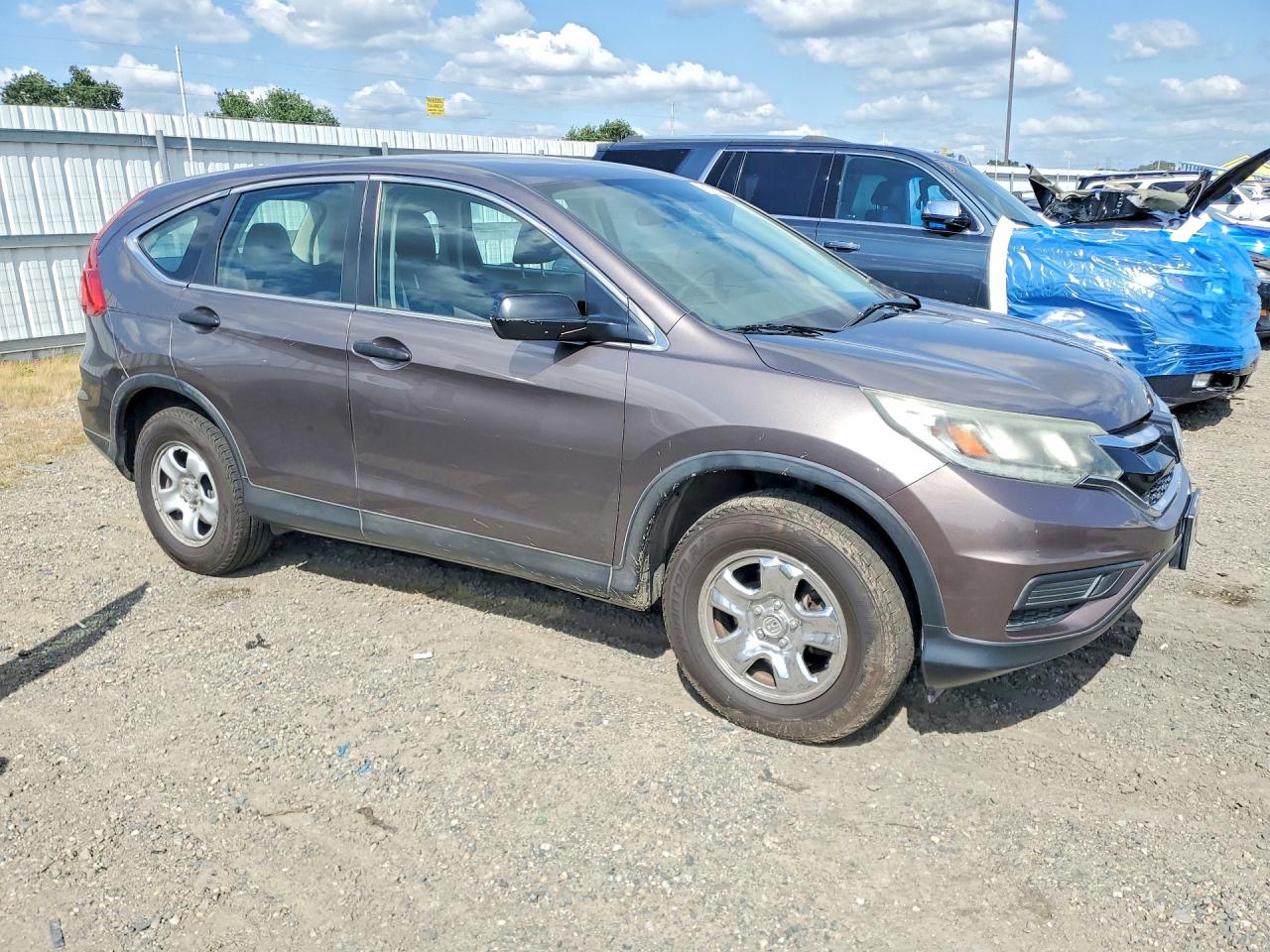 2015 Honda Cr-v Lx Brown vin: 3CZRM3H36FG700938