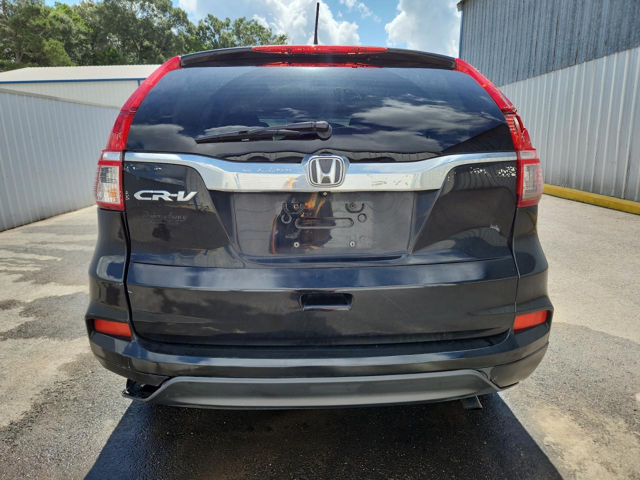 2015 Honda Cr-v Lx Black vin: 3CZRM3H3XFG709478 Damage: Rear Bumper Left Molding, Missing, Replacement Required