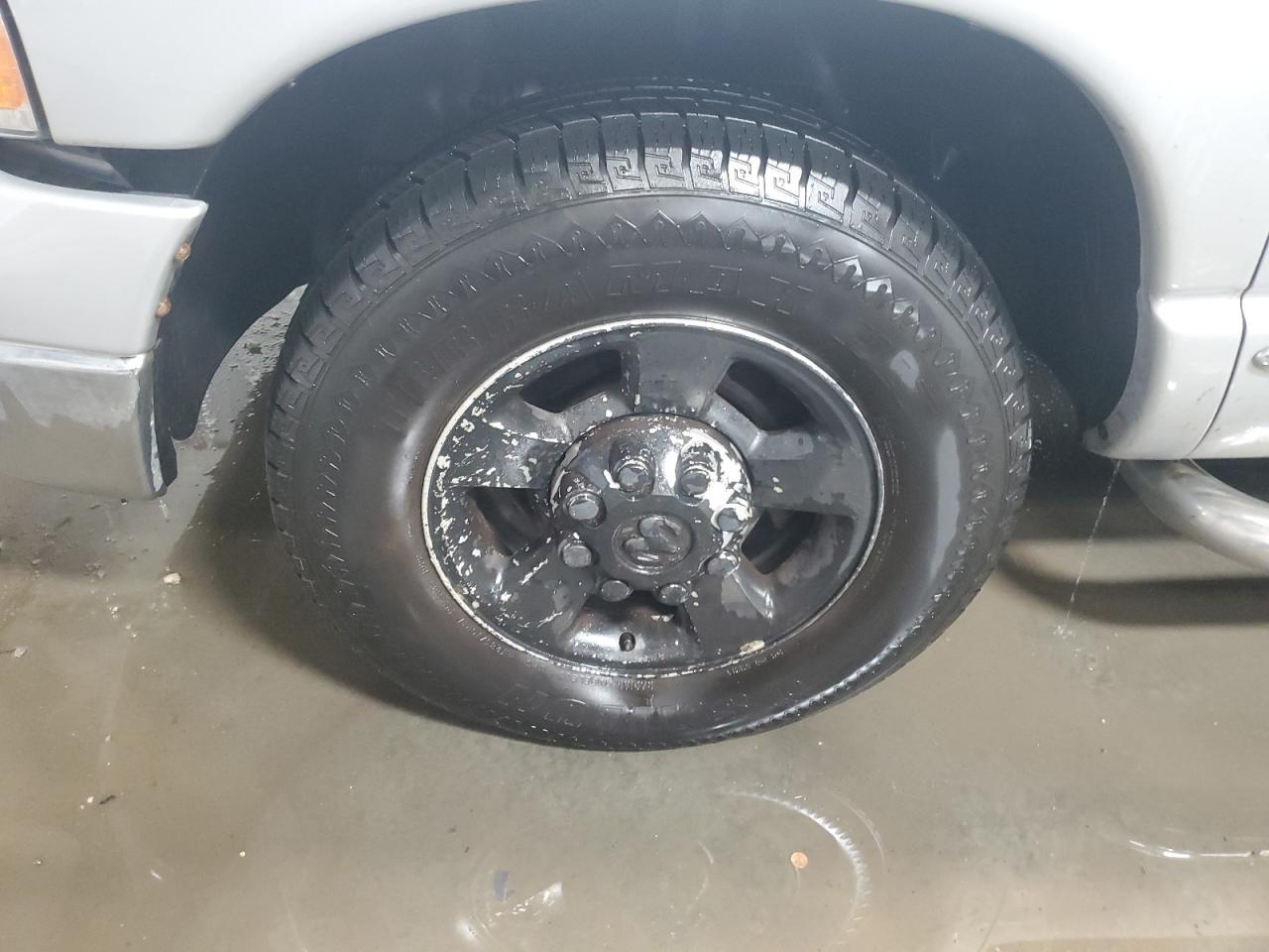 2004 Dodge Ram 2500 St Silver vin: 3D7KA28D54G176431 Damage: Left Front Wheel, Curb Rash, 6 To 7 Inches