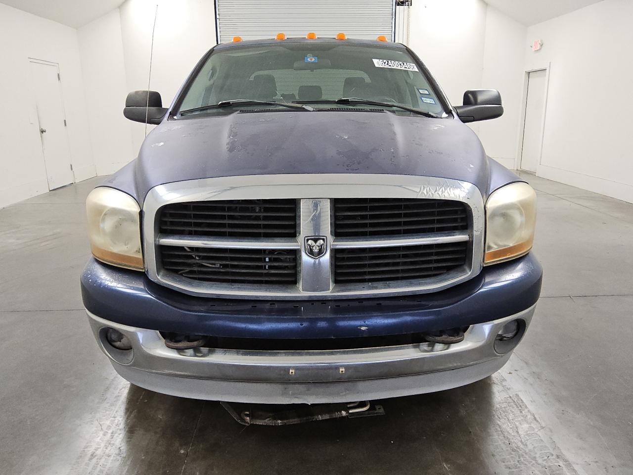 2006 Dodge Ram 2500 Blue vin: 3D7KR29C96G200103 Damage: Grille, Peeling, > 12 Inches