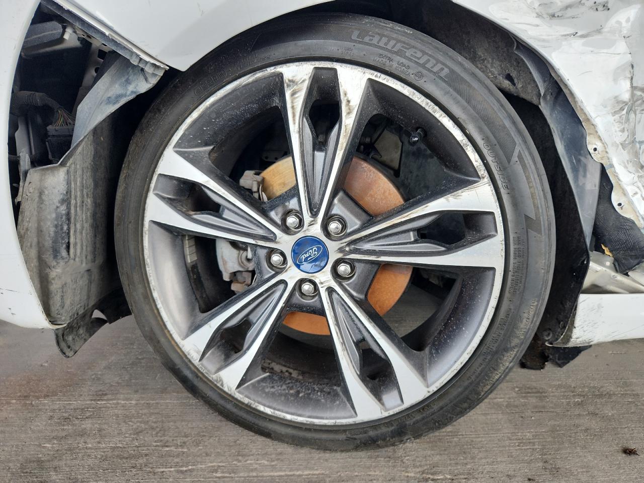 2019 Ford Fusion Titanium White vin: 3FA6P0D92KR153101 Damage: Left Front Wheel, Curb Rash, > 12 Inches