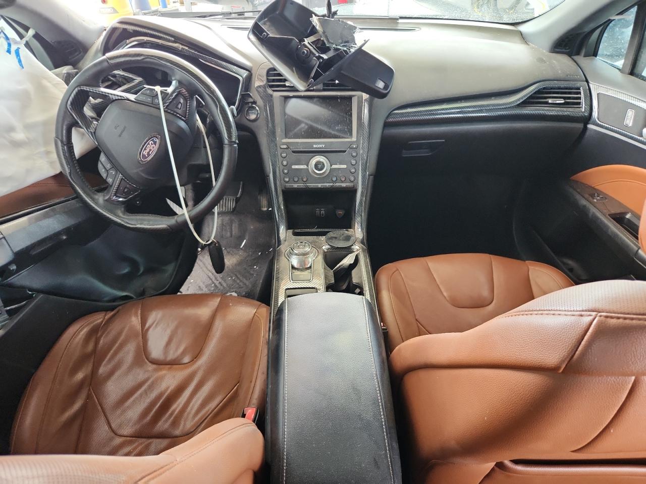 2019 Ford Fusion Titanium White vin: 3FA6P0D92KR153101 Damage: Left Front Seat Cushion, Worn, Acceptable