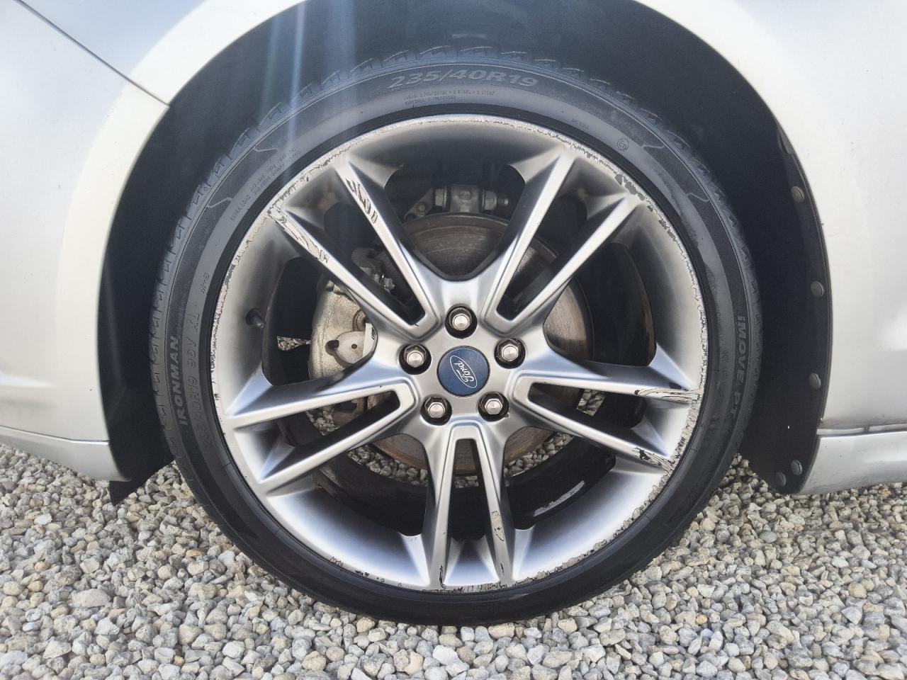 2013 Ford Fusion Titanium Серебряный vin: 3FA6P0K92DR138345 Damage: Left Front Wheel, Curb Rash, > 12 Inches