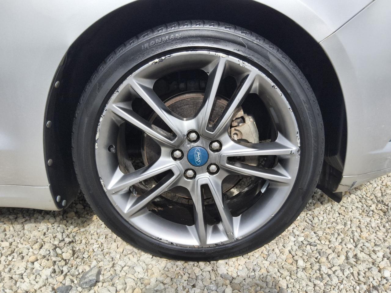 2013 Ford Fusion Titanium Серебряный vin: 3FA6P0K92DR138345 Damage: Right Front Wheel, Curb Rash, > 12 Inches