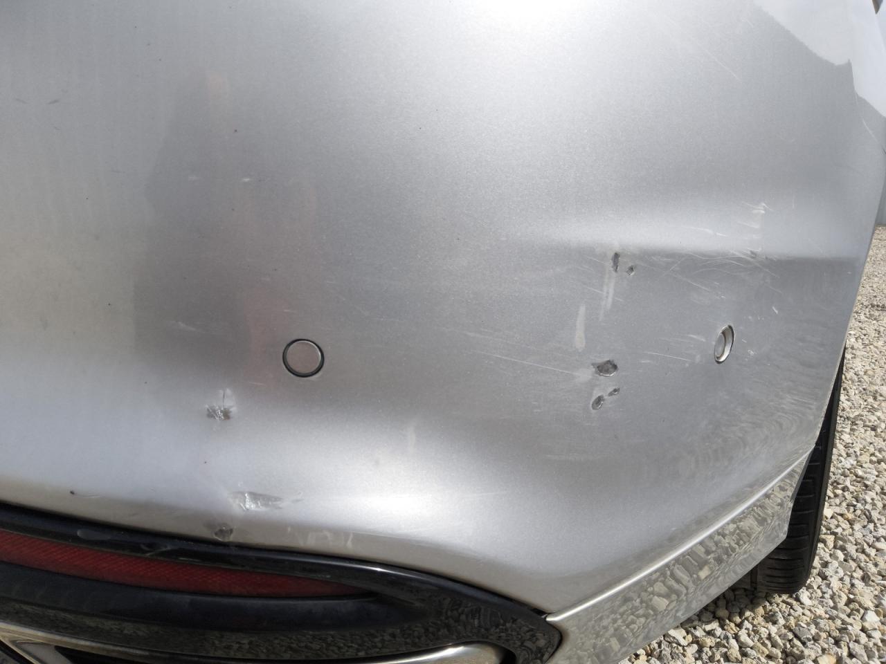 2013 Ford Fusion Titanium Серебряный vin: 3FA6P0K92DR138345 Damage: Rear Bumper, Dent(S) W/ Paint Dmg, 1 To 2 Inches