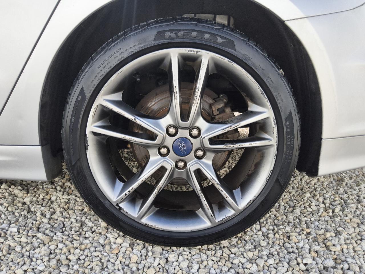 2013 Ford Fusion Titanium Серебряный vin: 3FA6P0K92DR138345 Damage: Left Rear Wheel, Curb Rash, > 12 Inches