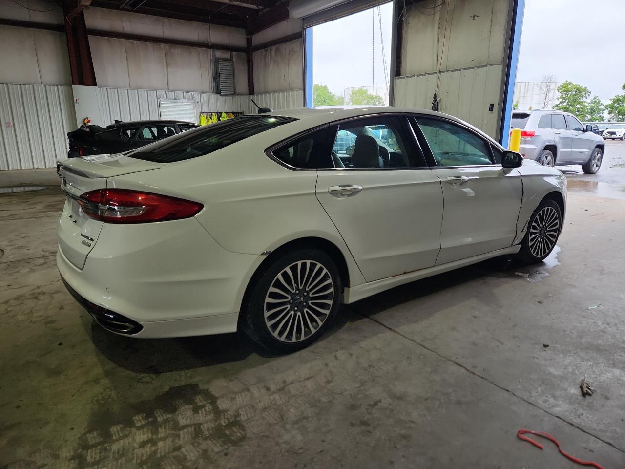 2017 Ford Fusion Titanium White vin: 3FA6P0K93HR131409 Damage: Right Qtr Panel, Peeling, 1 To 2 Inches