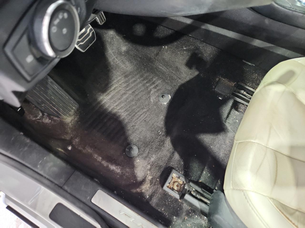 2017 Ford Fusion Titanium White vin: 3FA6P0K93HR131409 Damage: Left Front Carpet, Stained, Permanent