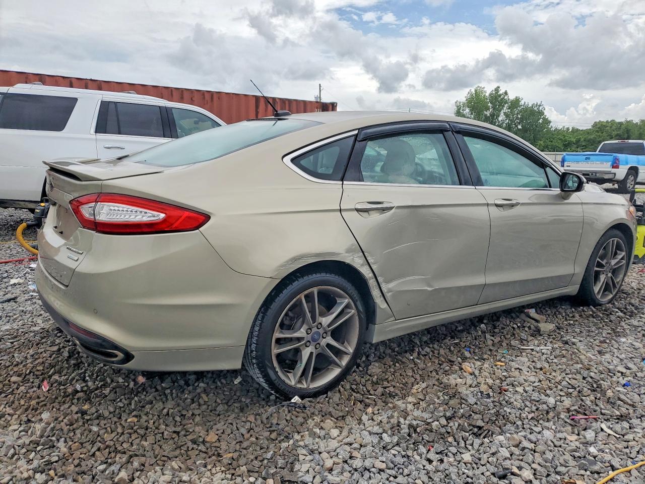 2016 Ford Fusion Titanium Gold vin: 3FA6P0K96GR183325