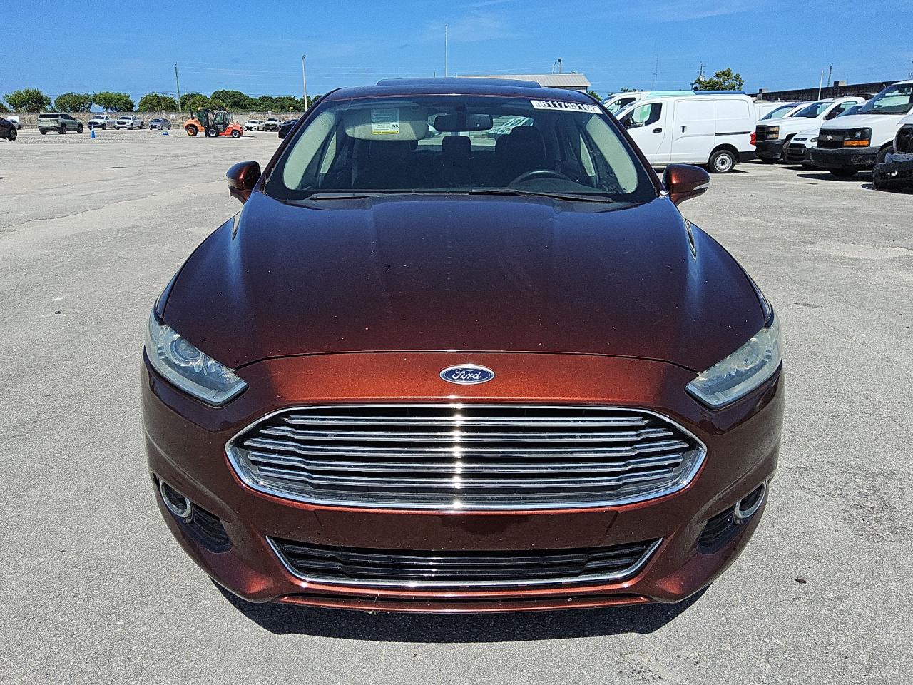 2015 Ford Fusion Titanium Brown vin: 3FA6P0K97FR269466 Damage: Hood, Chipped, 10 Or More
