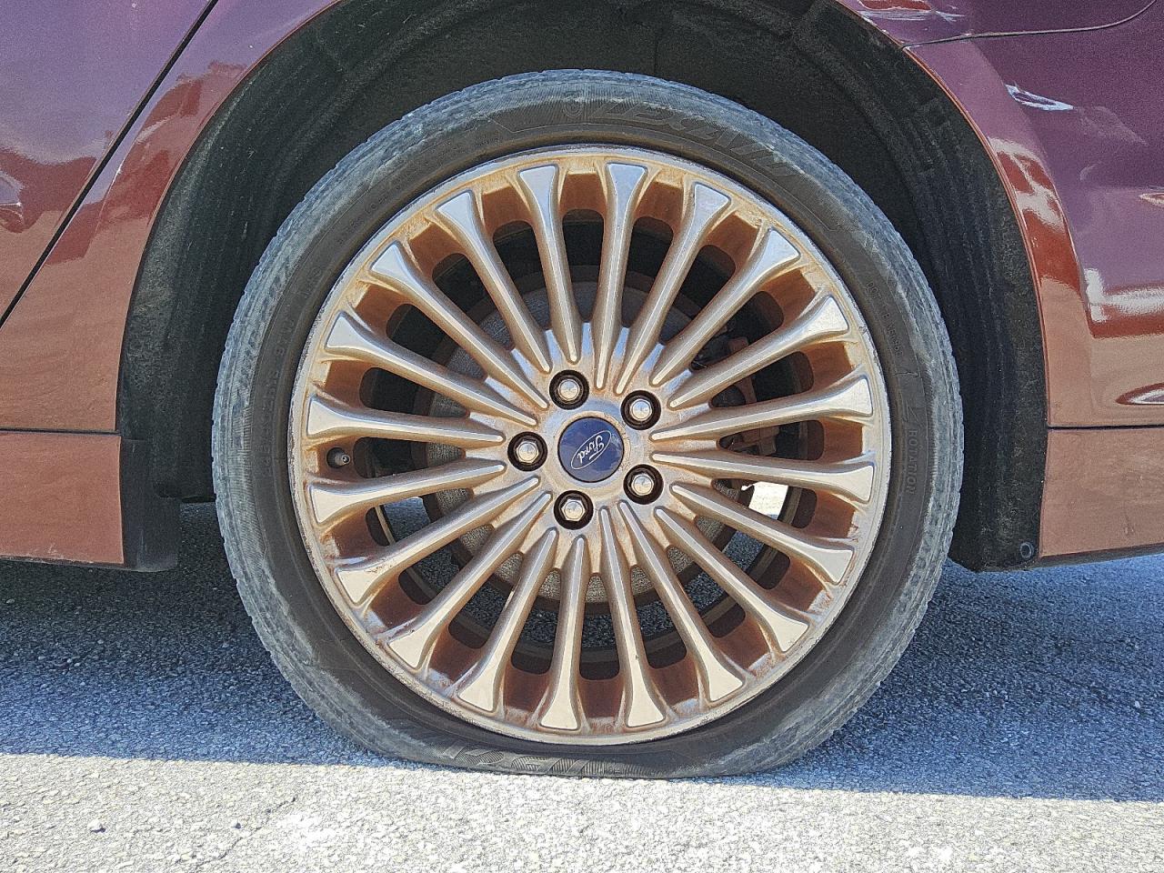 2015 Ford Fusion Titanium Brown vin: 3FA6P0K97FR269466 Damage: Left Rear Wheel, Curb Rash, > 12 Inches