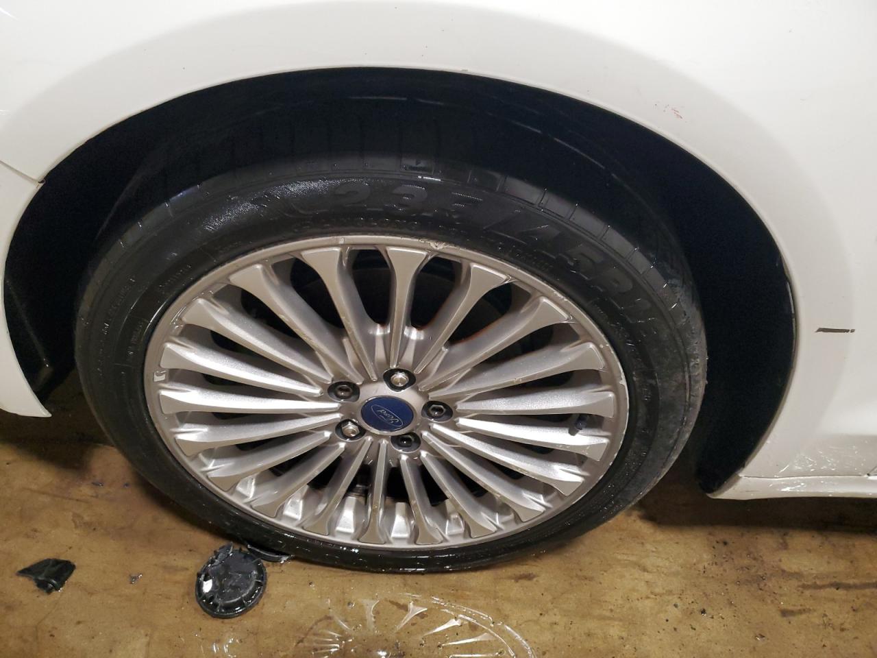 2016 Ford Fusion Titanium White vin: 3FA6P0K9XGR135469 Damage: Left Front Wheel, Curb Rash, 2 To 3 Inches