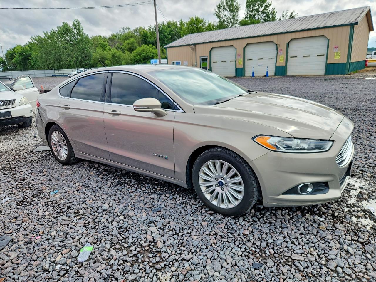 2015 Ford Fusion Se Hybrid Желто-коричневый vin: 3FA6P0LU6FR197985