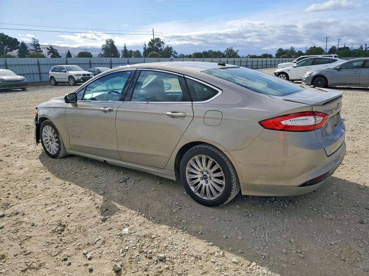 2015 Ford Fusion Titanium Hev Tan vin: 3FA6P0RU4FR273677
