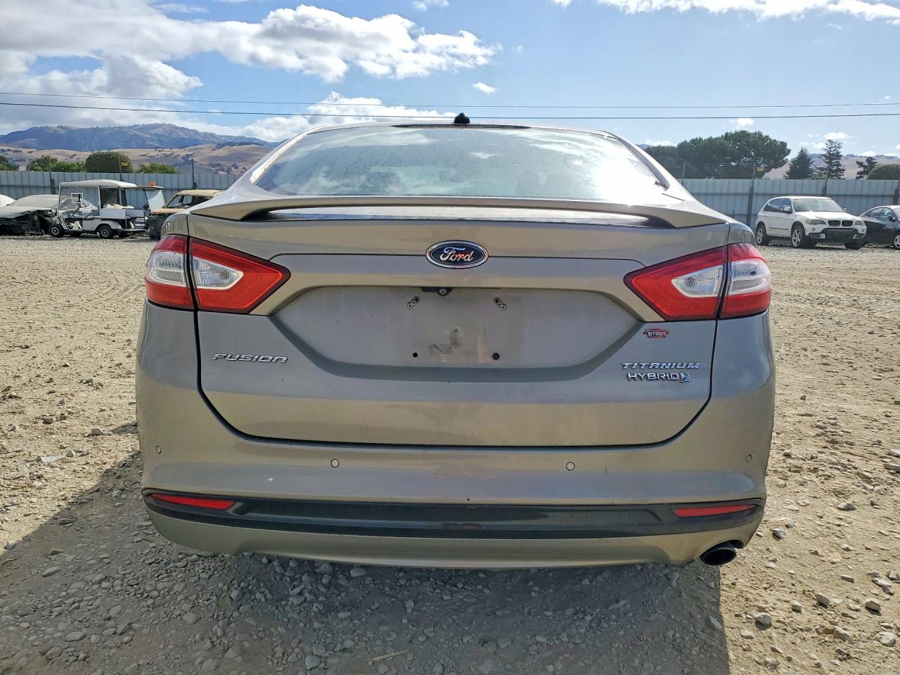 2015 Ford Fusion Titanium Hev Tan vin: 3FA6P0RU4FR273677