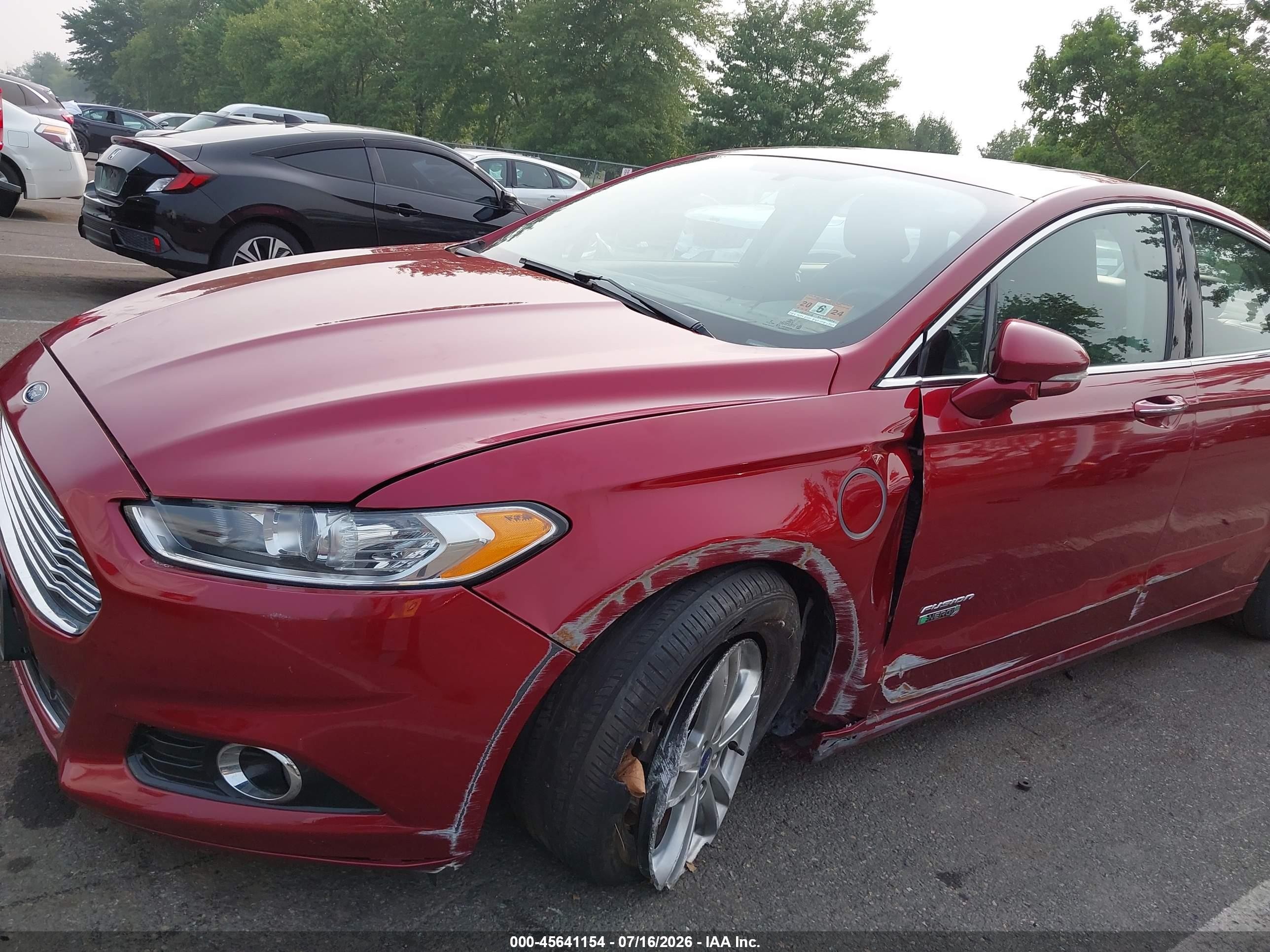 2015 Ford Fusion Energi Titanium Red vin: 3FA6P0SU3FR217417