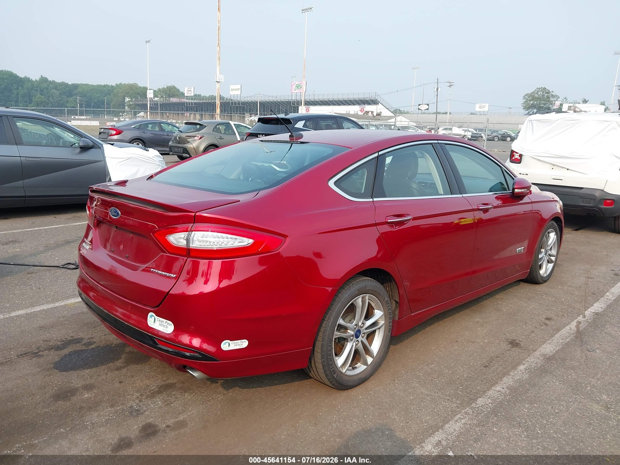 2015 Ford Fusion Energi Titanium Red vin: 3FA6P0SU3FR217417