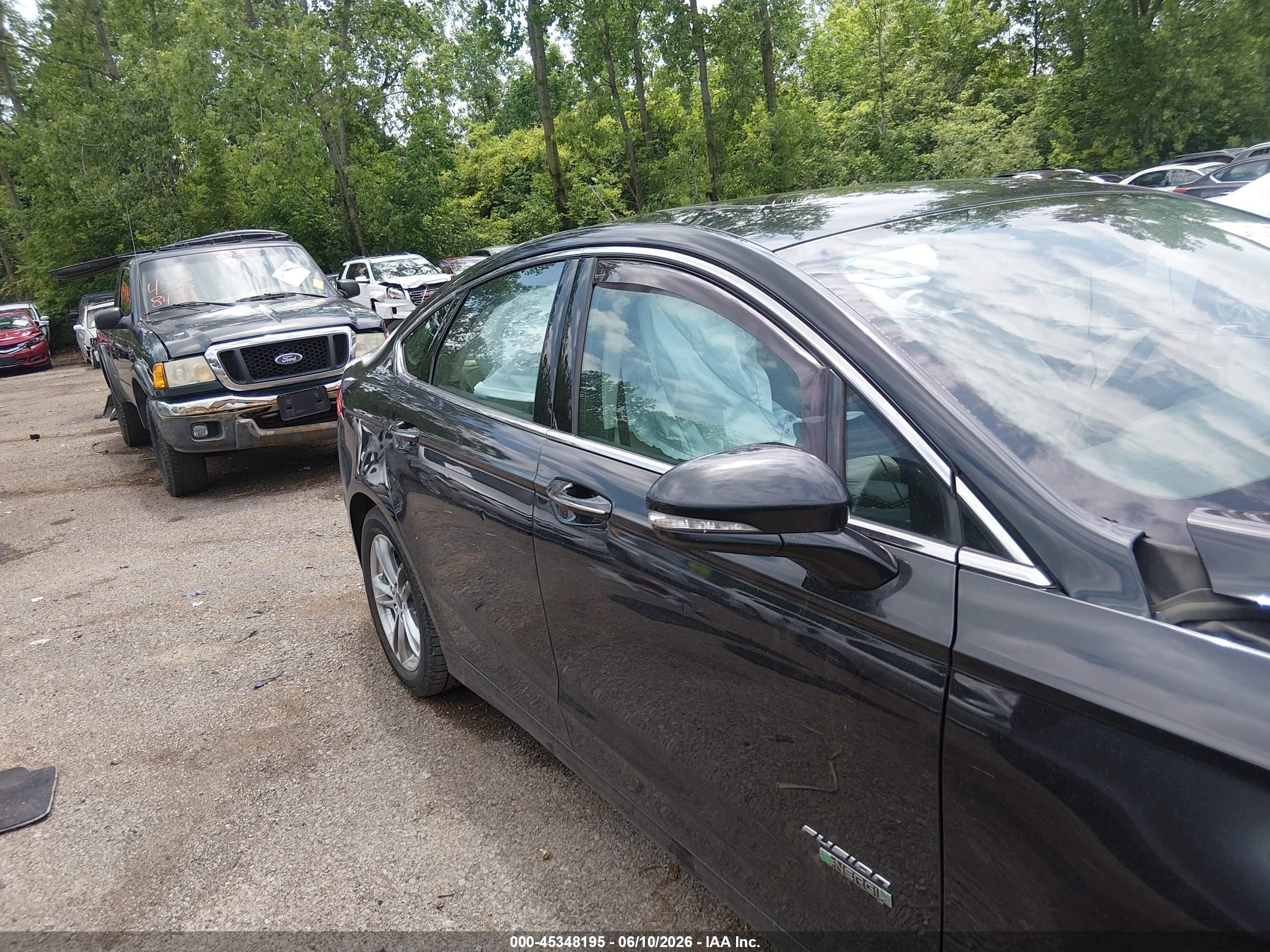 2015 Ford Fusion Energi Titanium Black vin: 3FA6P0SUXFR166207