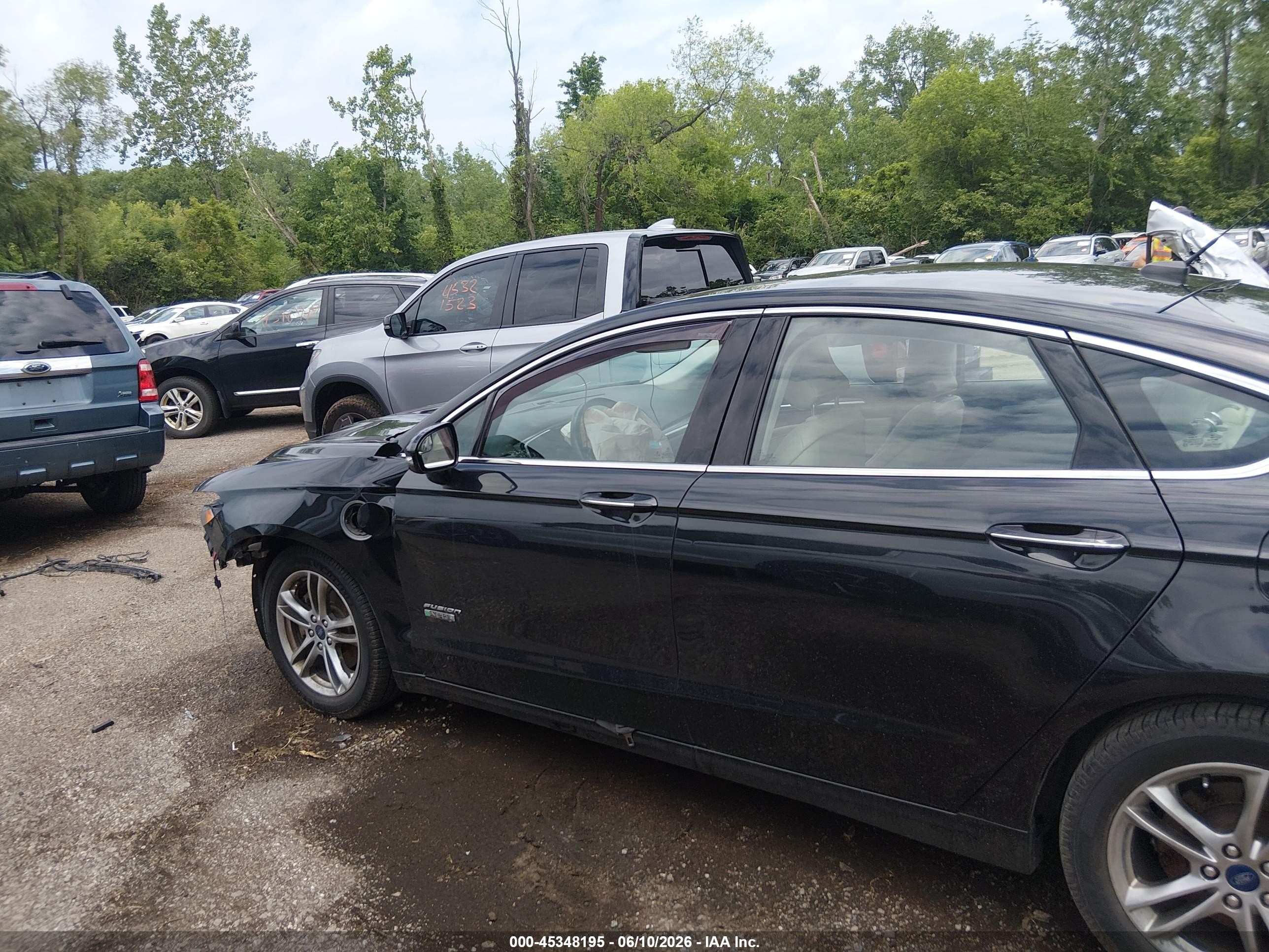 2015 Ford Fusion Energi Titanium Black vin: 3FA6P0SUXFR166207