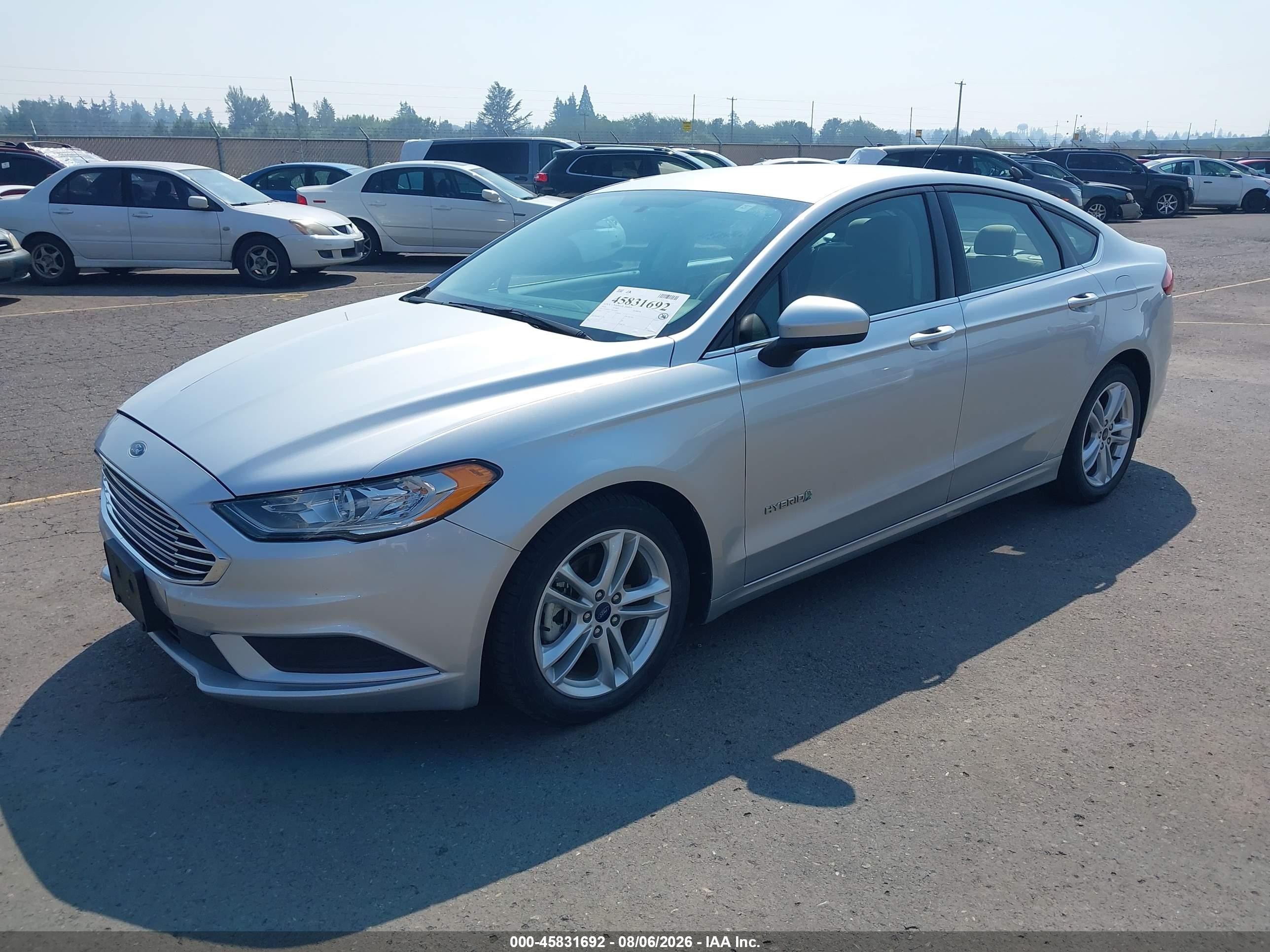 2018 Ford Fusion Hybrid S Серебряный vin: 3FA6P0UU3JR141882