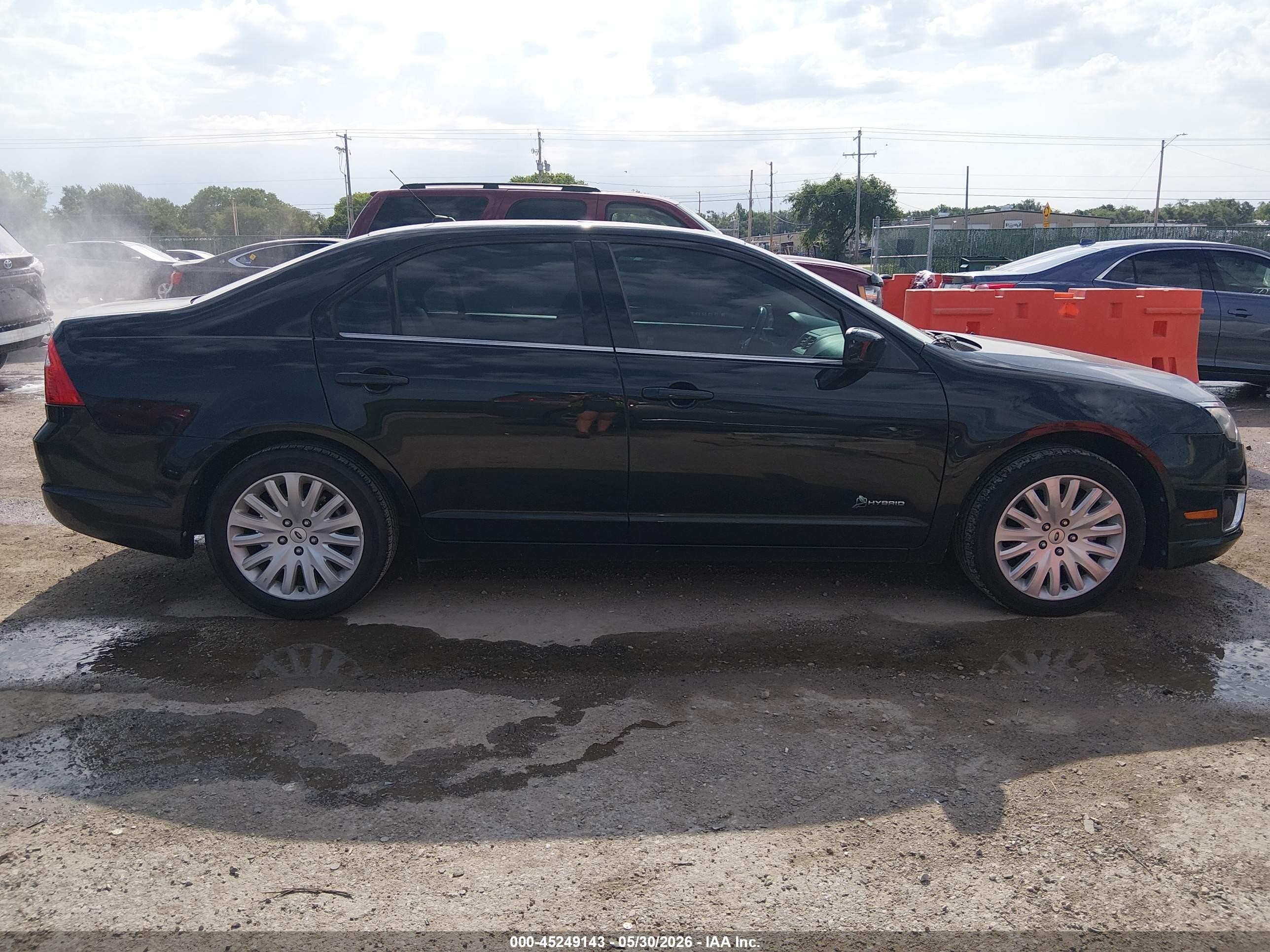 2010 Ford Fusion Hybrid   Black vin: 3FADP0L32AR303839