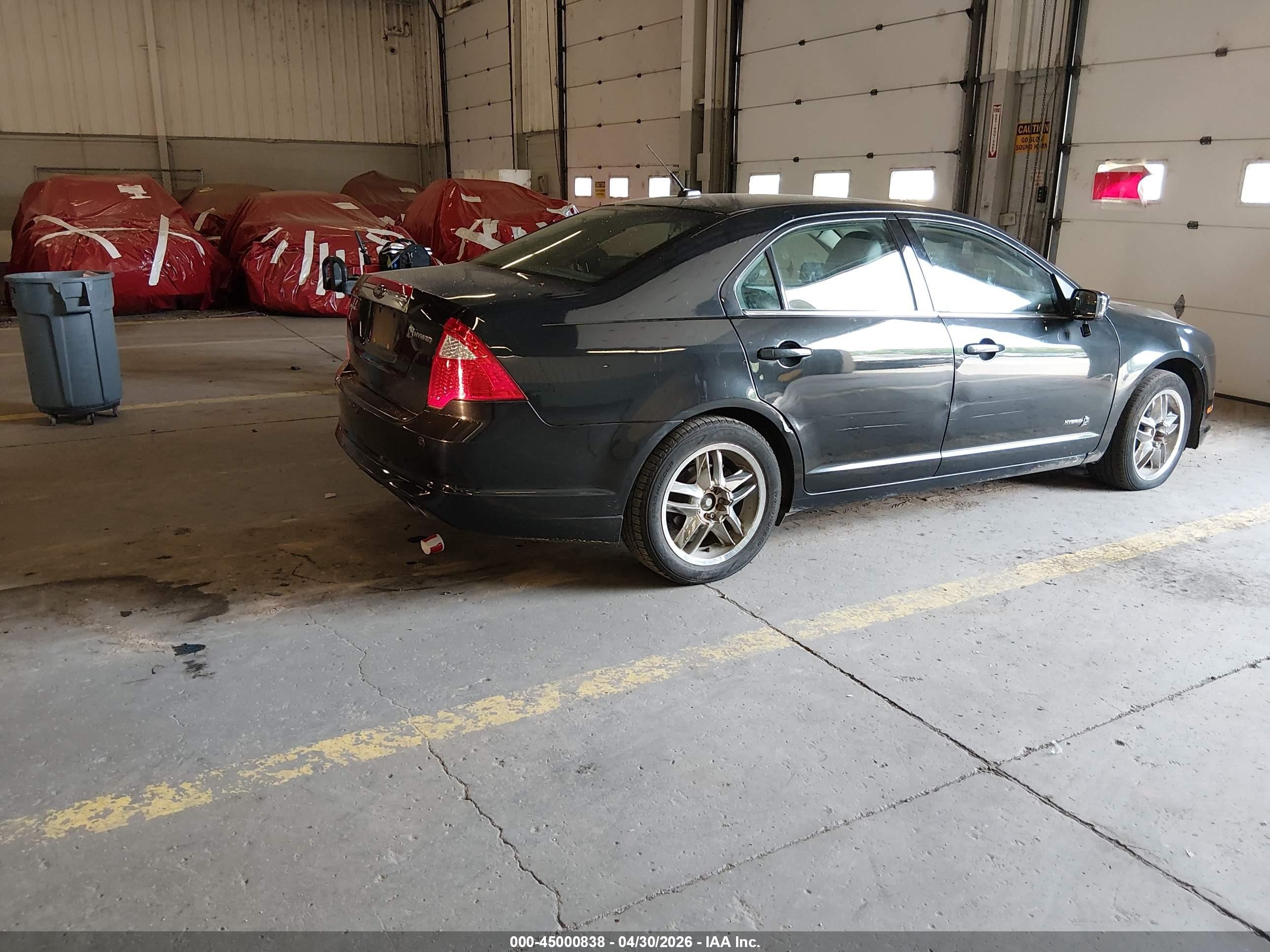 2010 Ford Fusion Hybrid   Black vin: 3FADP0L32AR308040