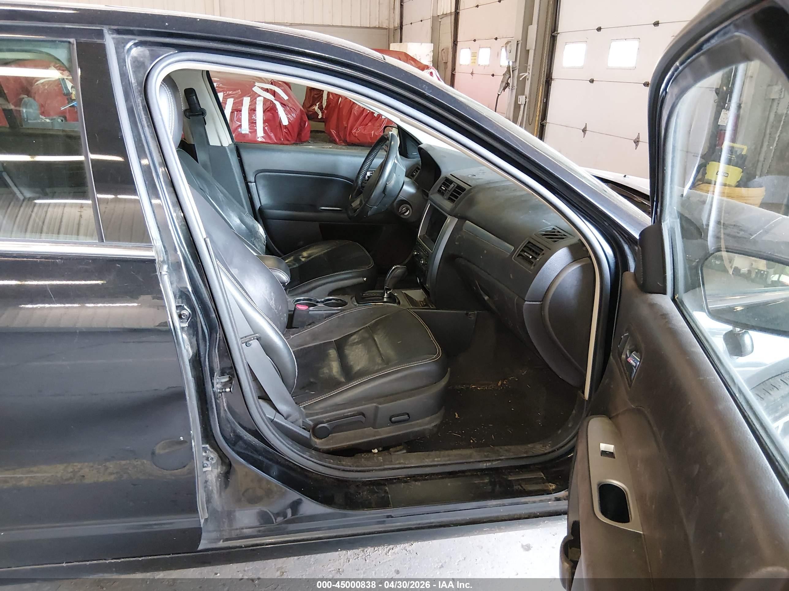 2010 Ford Fusion Hybrid   Black vin: 3FADP0L32AR308040