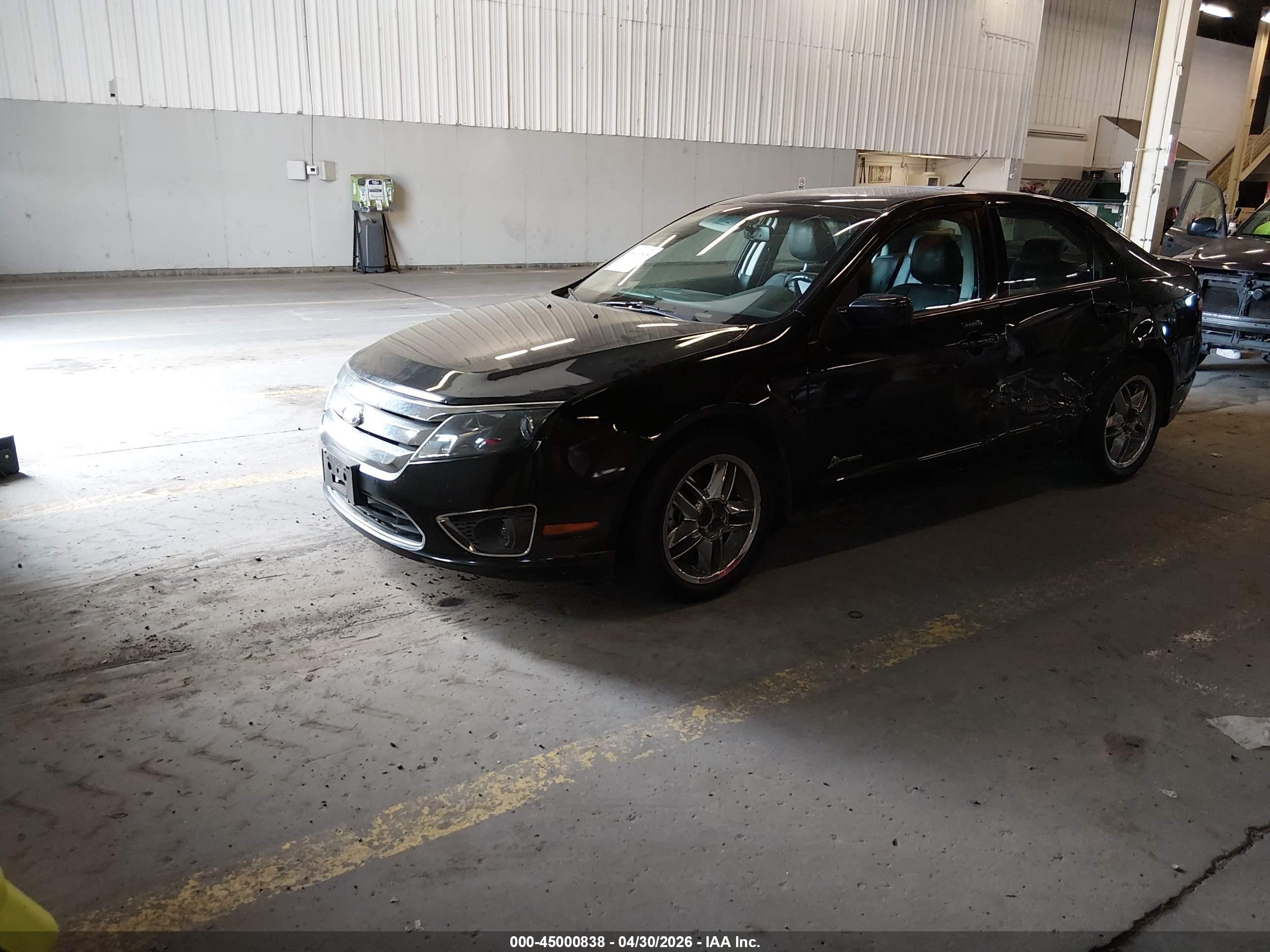 2010 Ford Fusion Hybrid   Black vin: 3FADP0L32AR308040