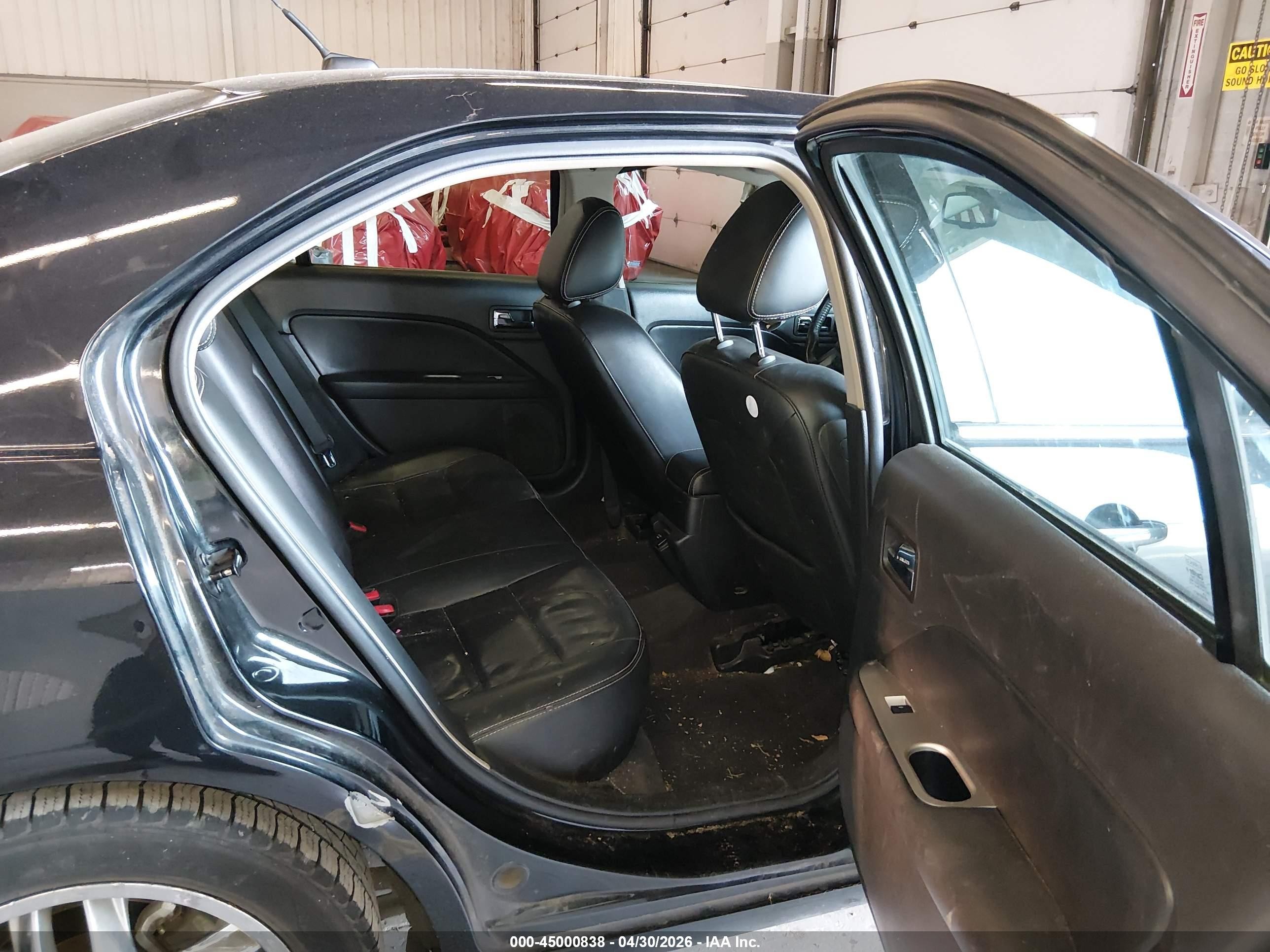 2010 Ford Fusion Hybrid   Black vin: 3FADP0L32AR308040