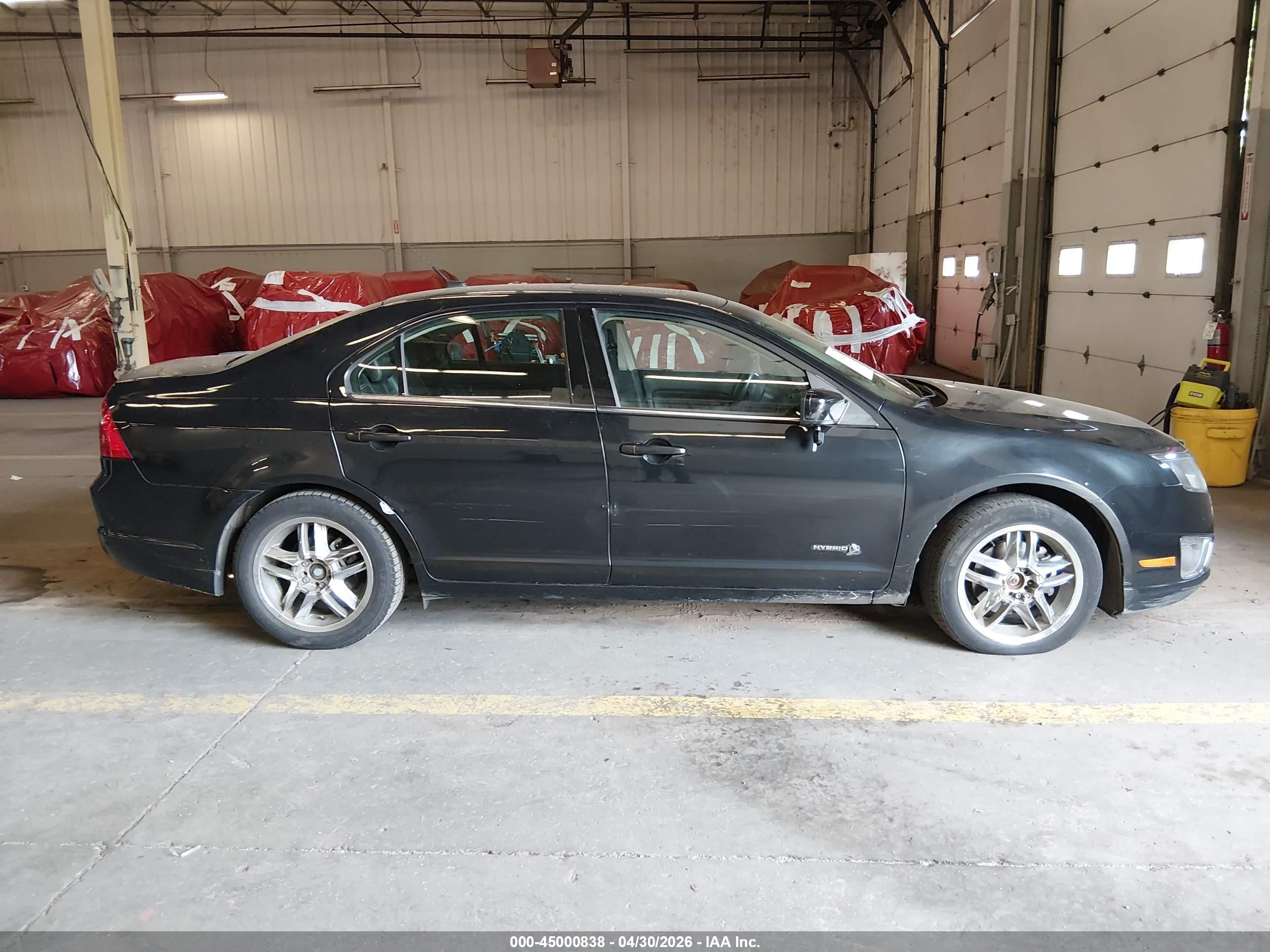 2010 Ford Fusion Hybrid   Black vin: 3FADP0L32AR308040