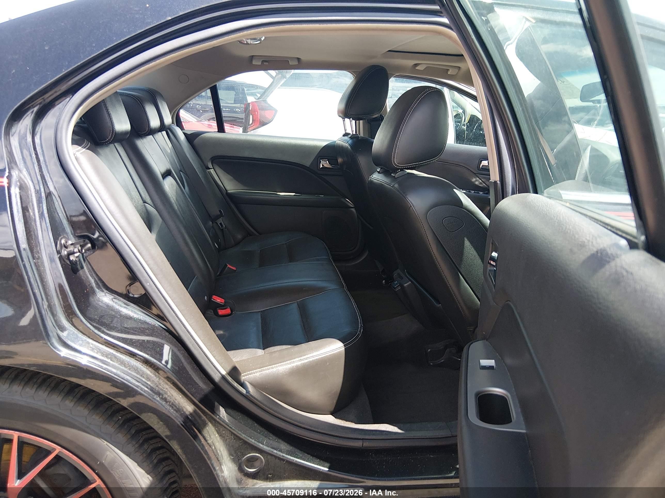 2010 Ford Fusion Hybrid   Black vin: 3FADP0L35AR100329