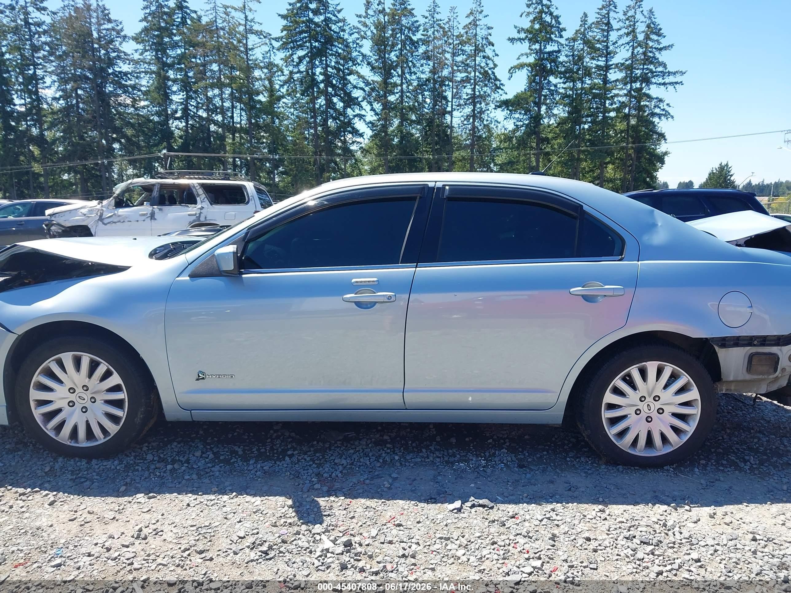 2010 Ford Fusion Hybrid   Light Blue vin: 3FADP0L35AR418905
