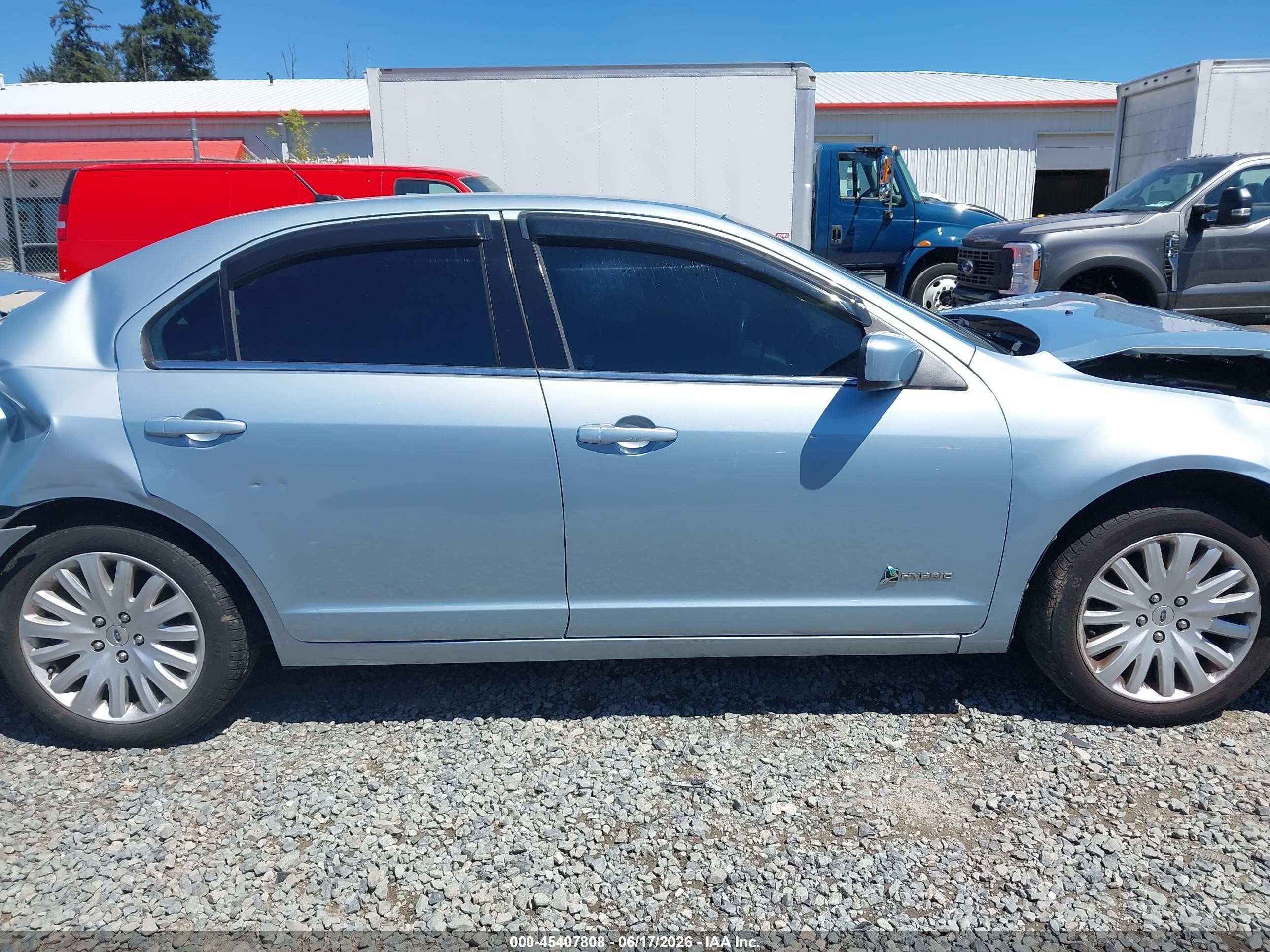 2010 Ford Fusion Hybrid   Light Blue vin: 3FADP0L35AR418905