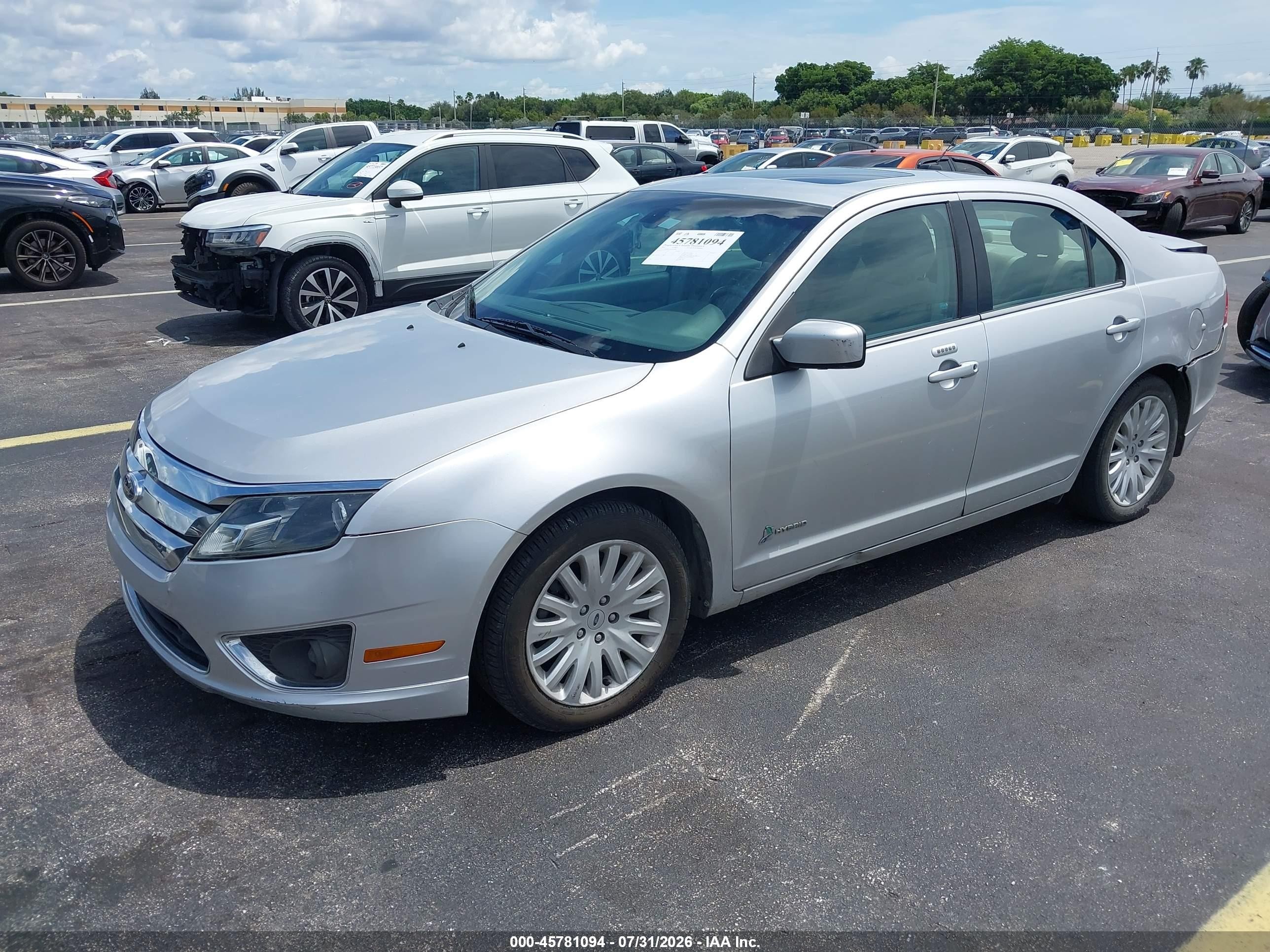 2012 Ford Fusion Hybrid Серебряный vin: 3FADP0L36CR245821