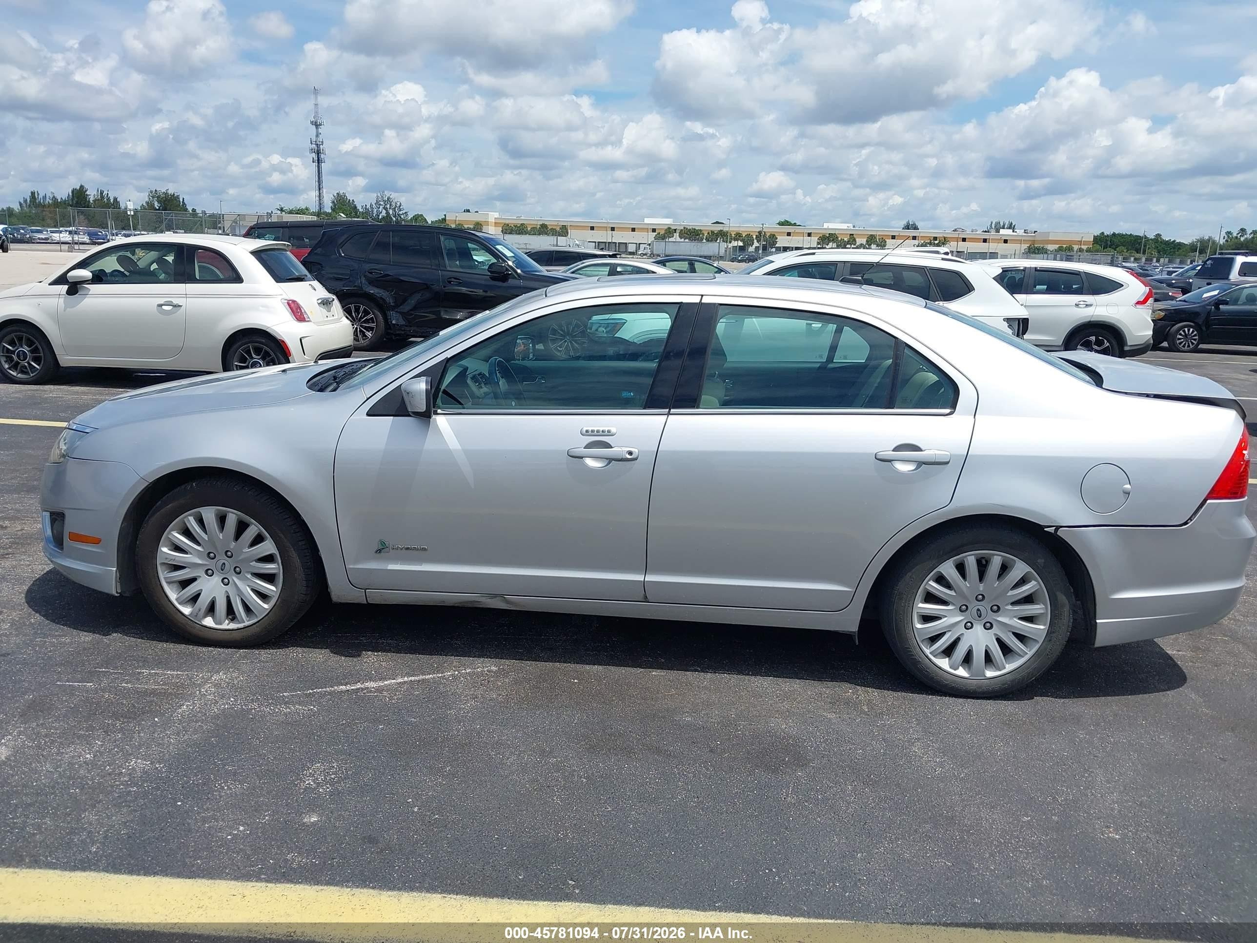 2012 Ford Fusion Hybrid Серебряный vin: 3FADP0L36CR245821