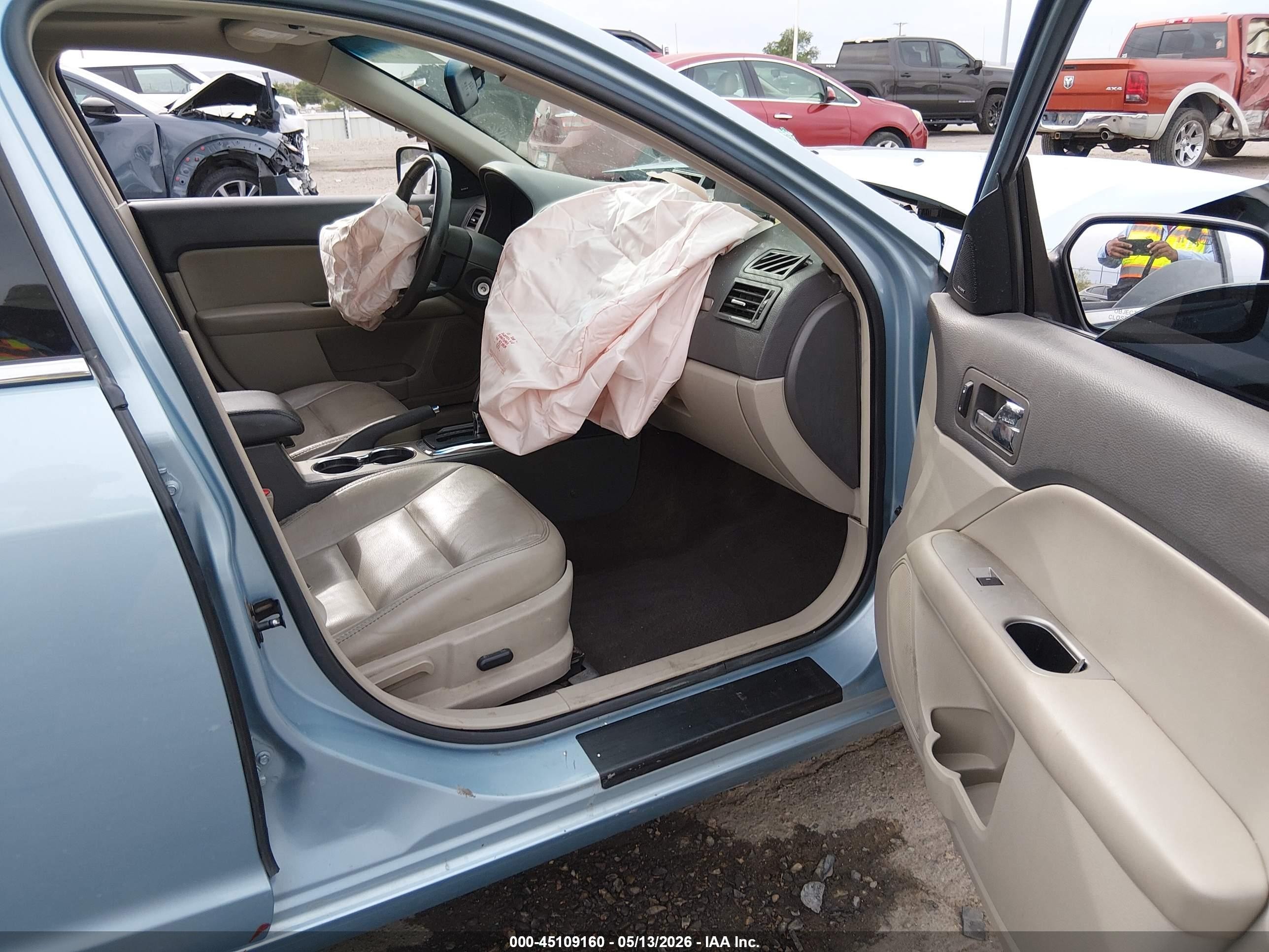 2010 Ford Fusion Hybrid   Light Blue vin: 3FADP0L37AR270773