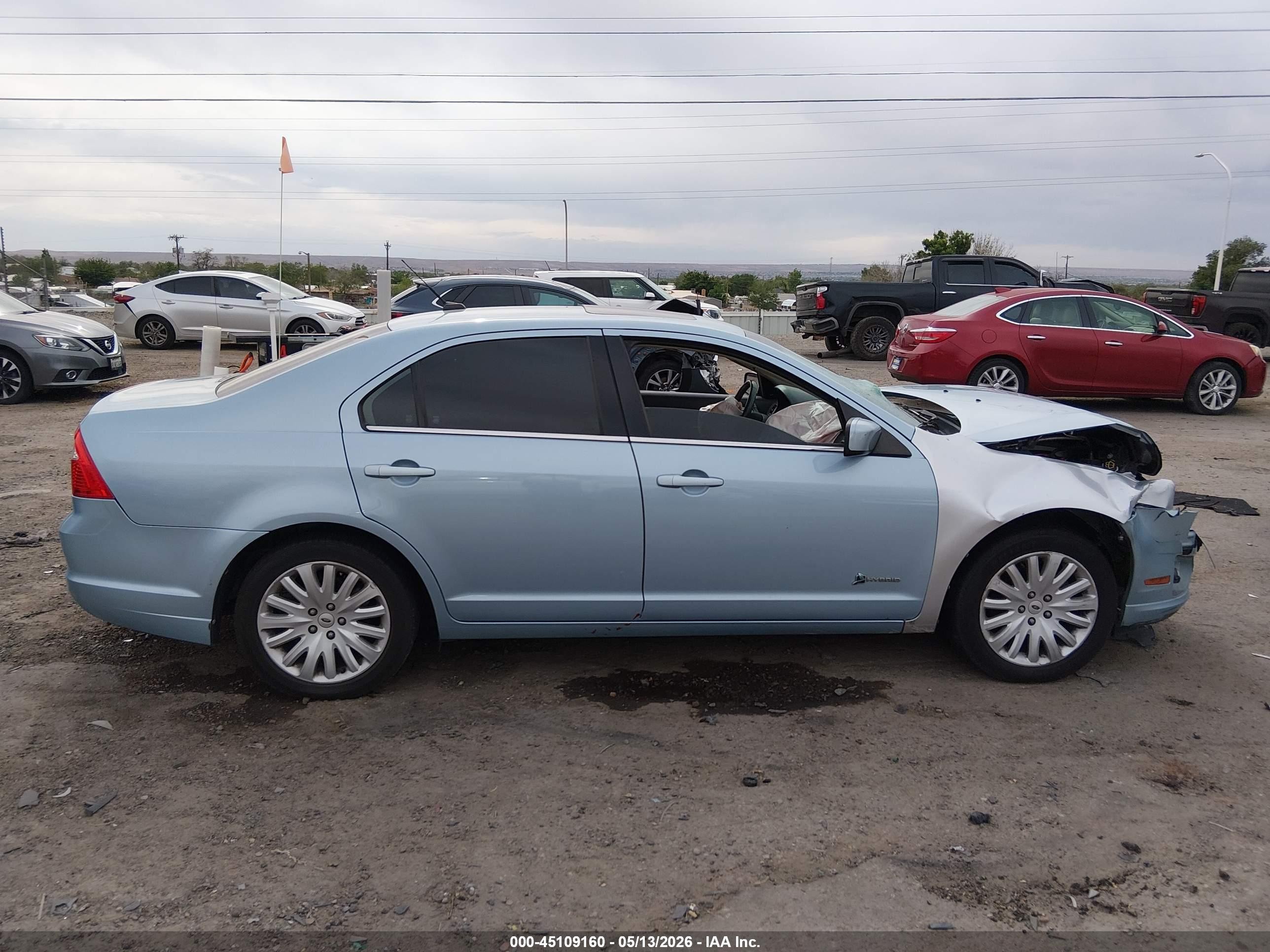 2010 Ford Fusion Hybrid   Light Blue vin: 3FADP0L37AR270773
